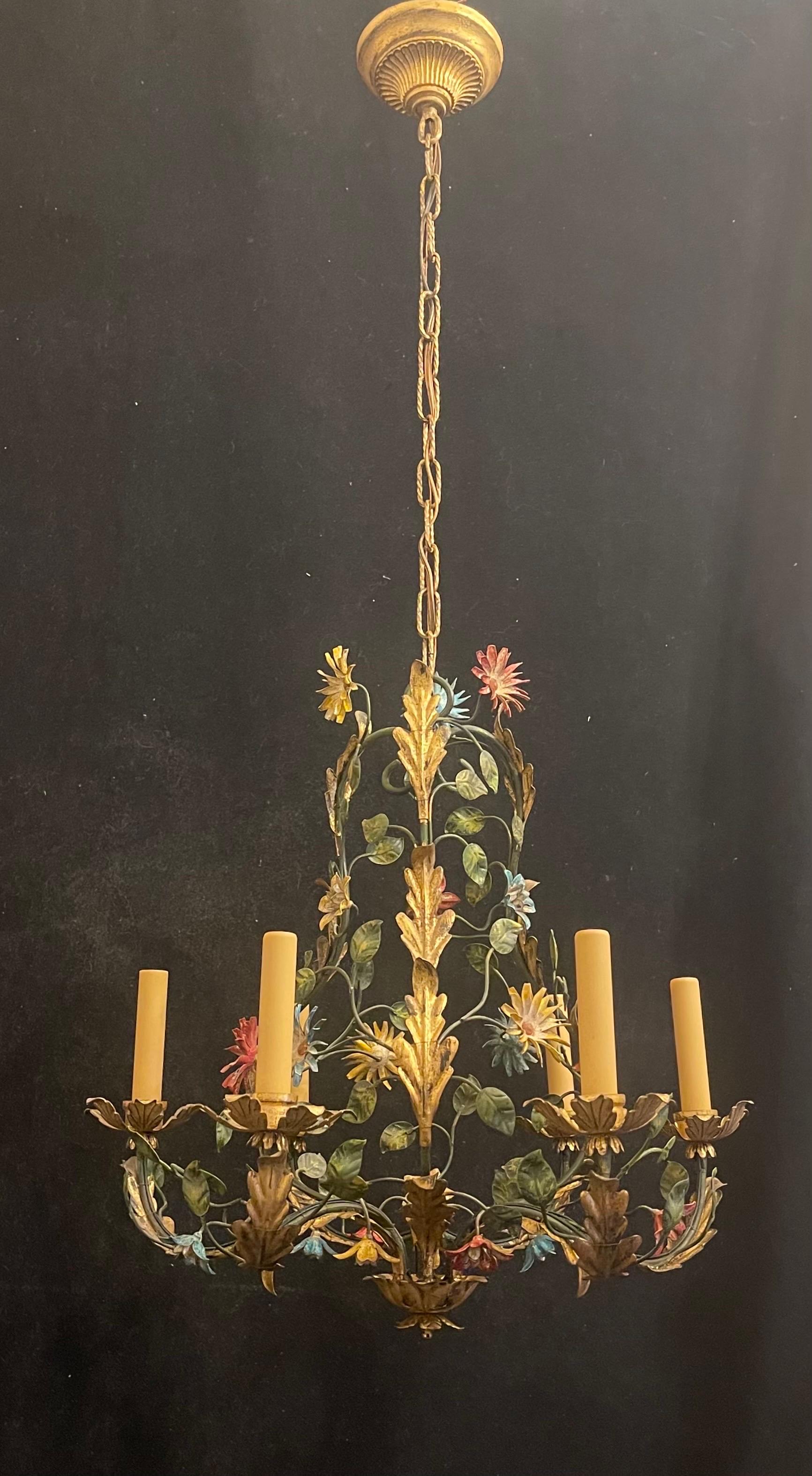 A wonderful and very fine shabby chic Italian gold gilt tole polychrome 6 candelabra light fixture in a basket form chandelier.
Wiring has been updated and comes with chain, canopy and mounting hardware for installation.