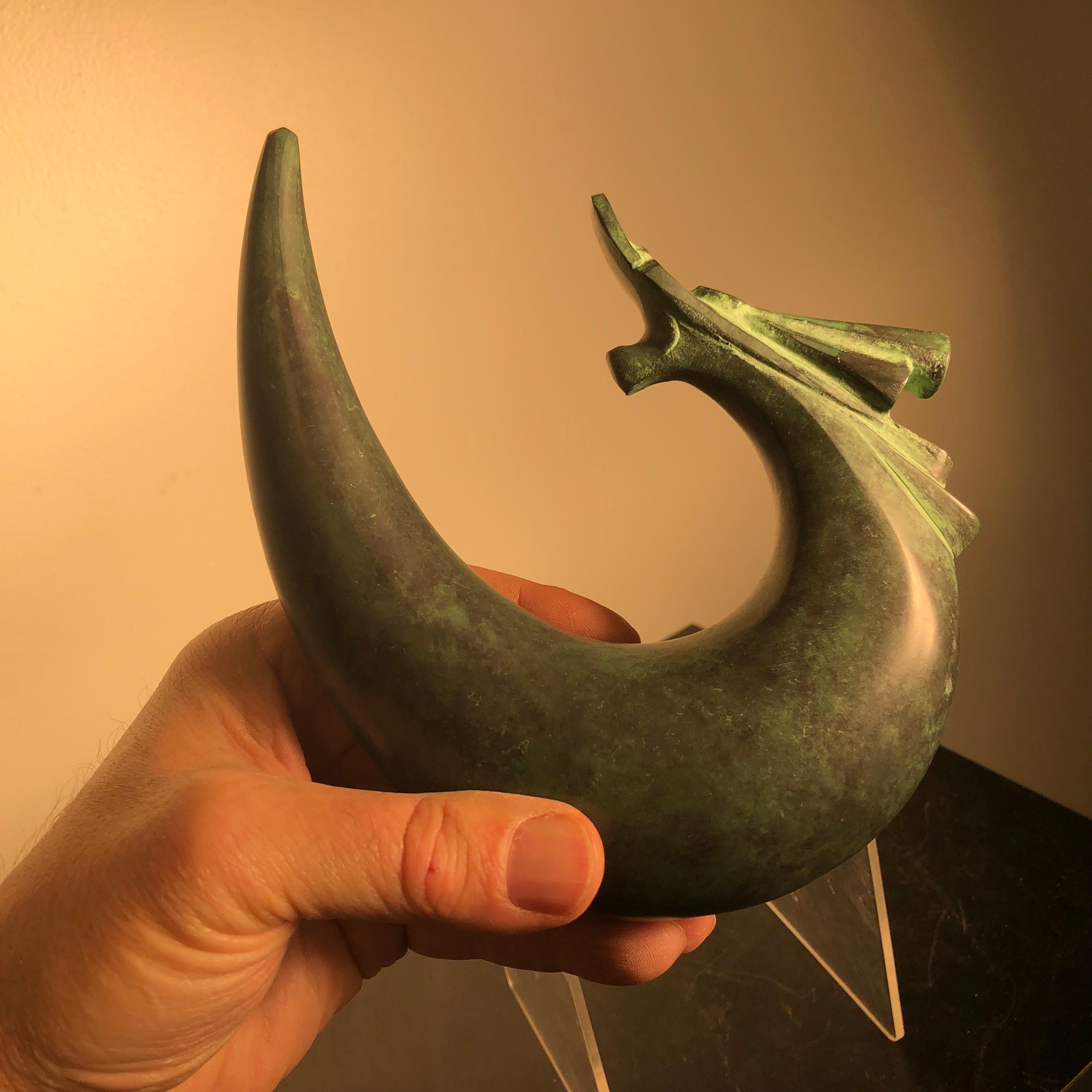 An important artist signed Dragon Sculpture.

Here's a lovely and unique way to accent your indoor display space or outdoor garden space with this very unusual treasure from Japan! 

This is an attractive solid and finely hand cast bronze effigy