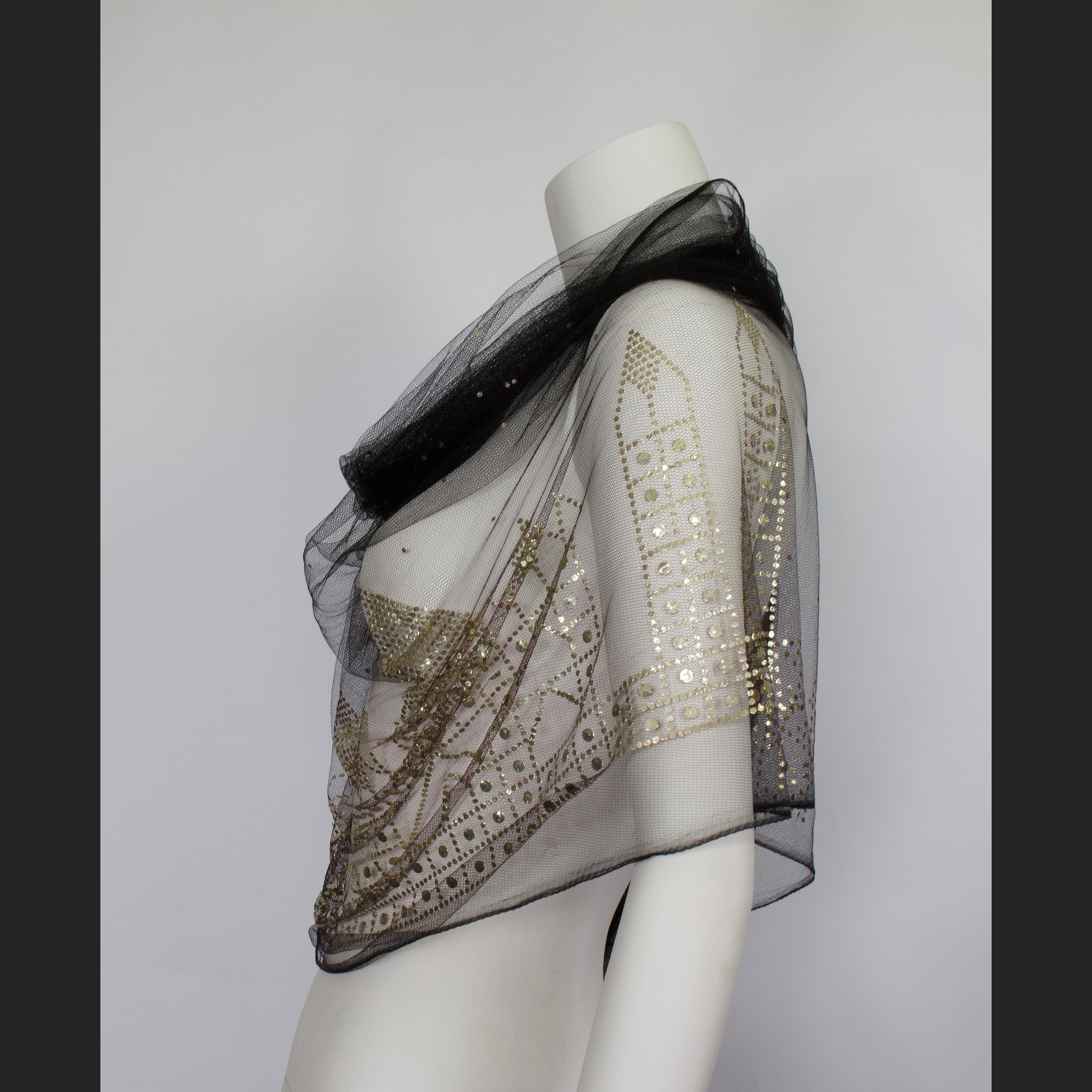 Product Details: Fine Silver Metal Sequin - Soft Mesh Tulle Net Wrap Scarf / Shawl - Raw Edge Hemline - RARE - Intricate Fine Silver Sequin Detailing Throughout - NEW
Label: Unknown
Materials: Fine Silver Sequin - Soft Mesh Tulle Net / Black
Scarf