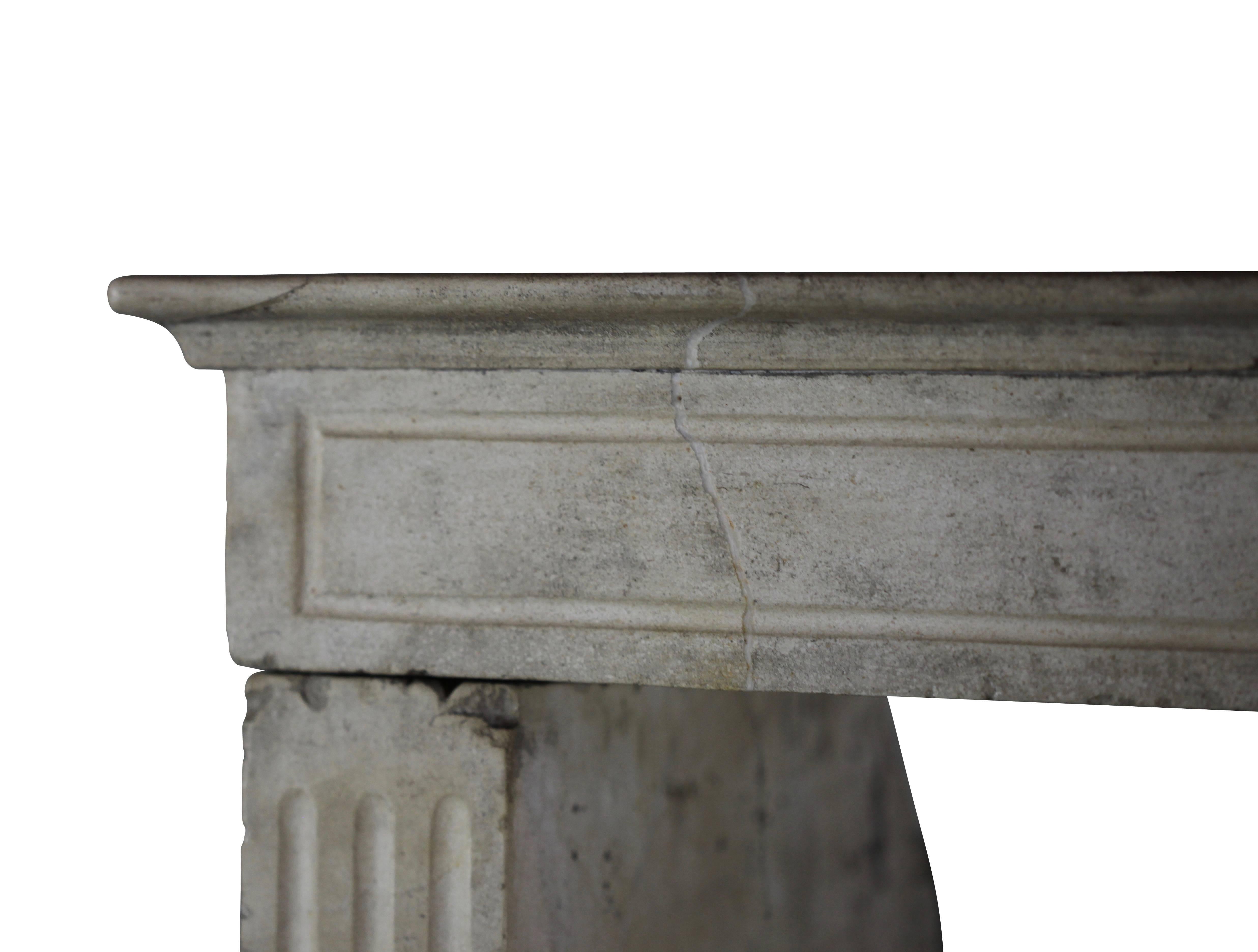 This mantel (fireplace) is in a Burgundy hard limestone. It has a very nice patina and a lions head in the center of the front piece. Ready for a modernist or Classic small room.

Measures: 122.5 cm EW 48.22