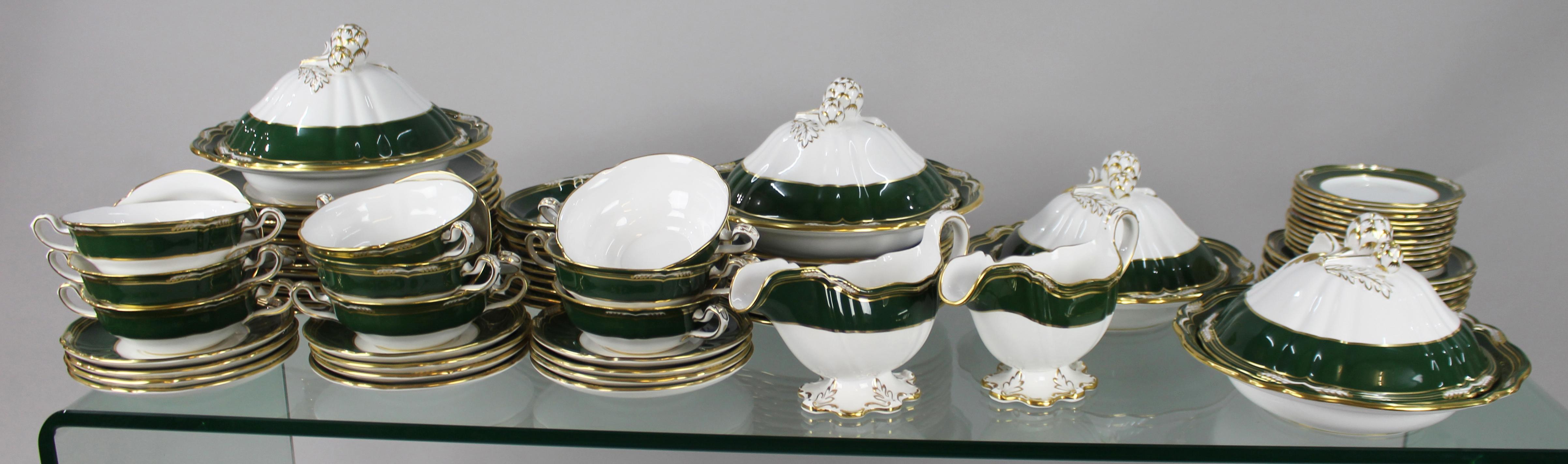 Fine Spode Harrogate Bone China Dinner Service 


Late 20th century, English, c.1980

Spode, Harrogate pattern, all pieces stamped by the factory to the underside

Fine bone china with rich green & gilt decoration

All pieces pictured, 86