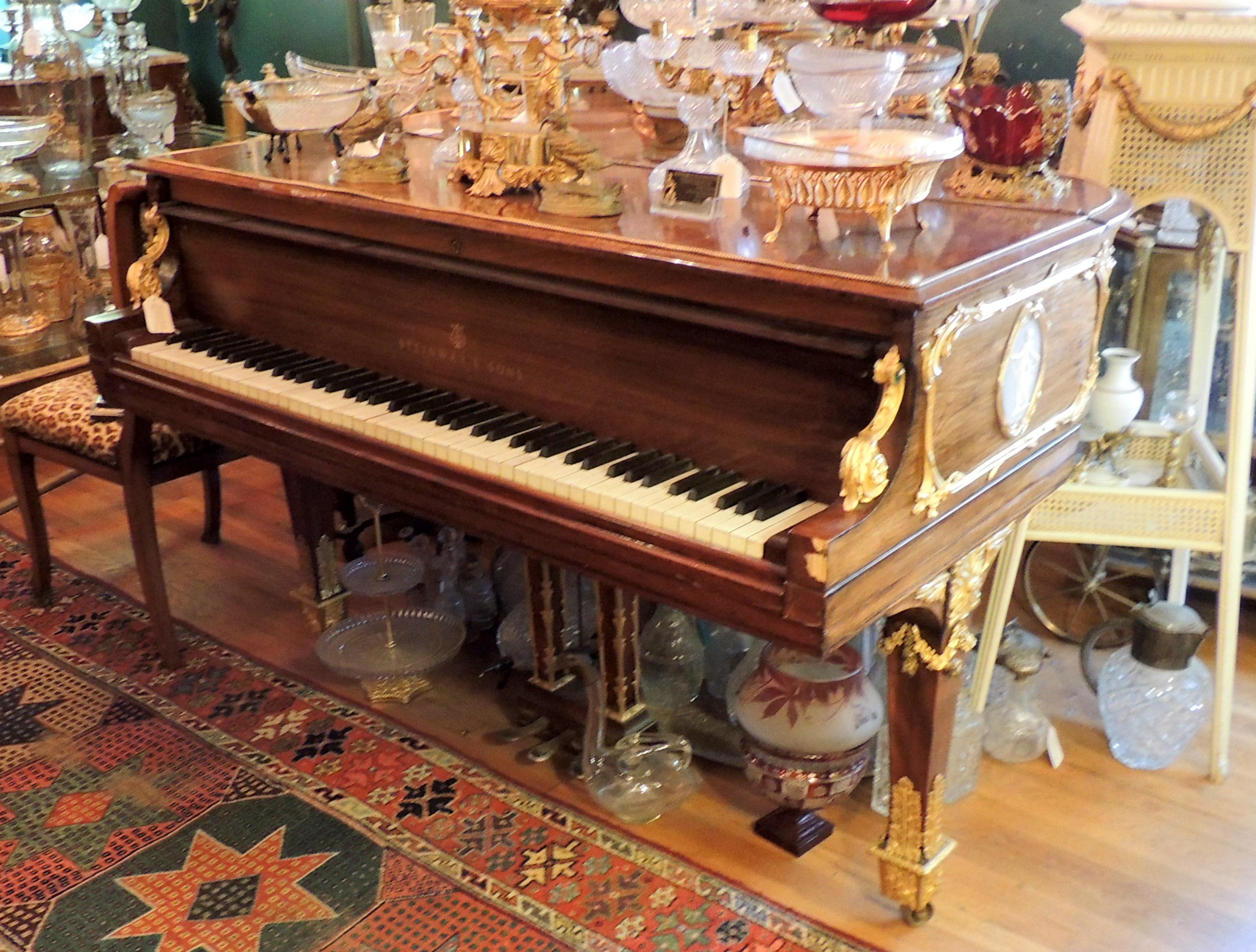 antique baby grand piano