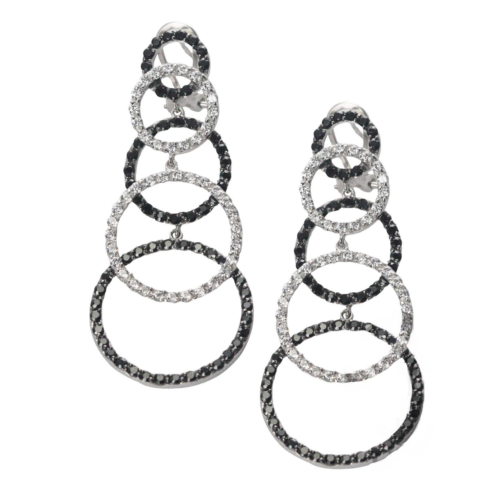  9.25 purity sterling silver
- Hypoallergenic, nickel free
- Wt. 18.4/gm
- 0.5 micron natural rhodium plating
- Set with exclusive FERI Swan cut lab stones
-Lever-back earrings
- Black and white