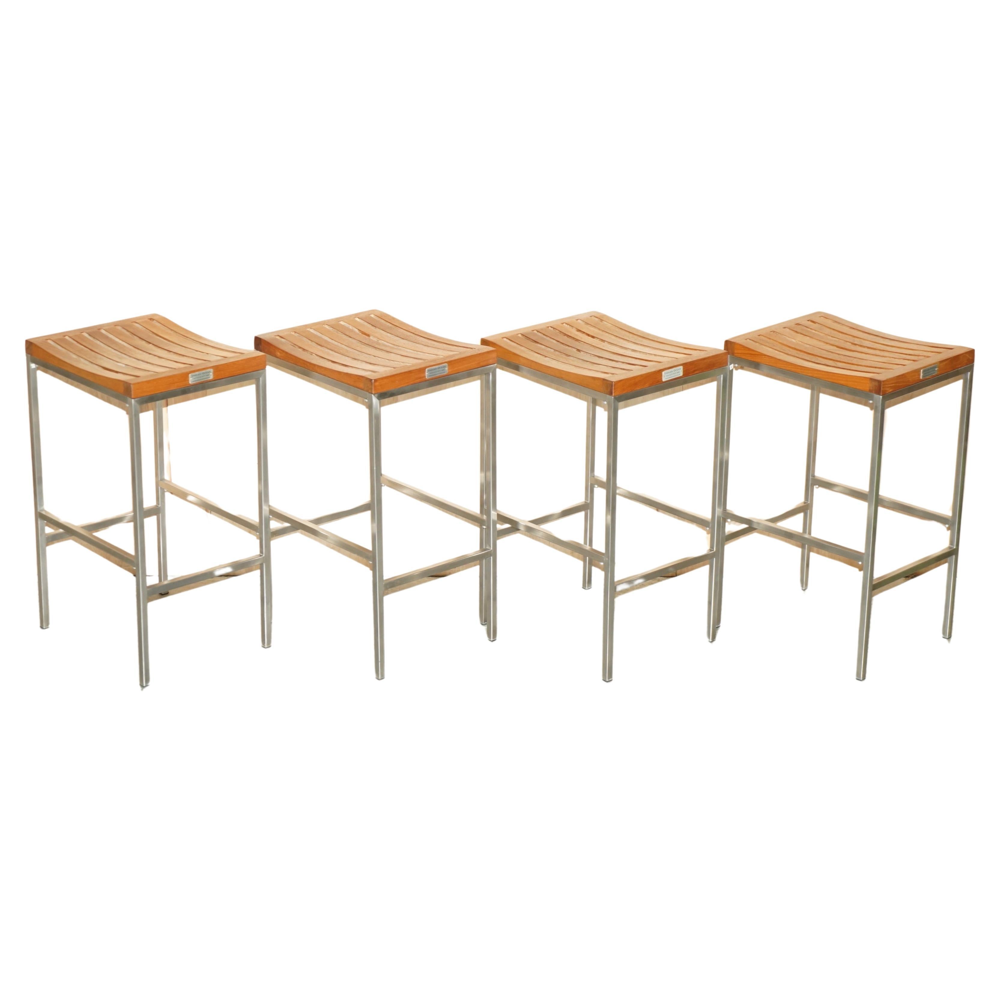 FINE SUiTE OF FOUR INDIAN OCEAN METAL AND SLATTED WOOD BAR OR KITCHEN STOOLS