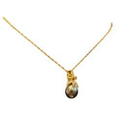 Pendentif en or jaune 18 carats avec perle de Tahiti de 11 mm et diamant de 0,25 carat (uniquement)