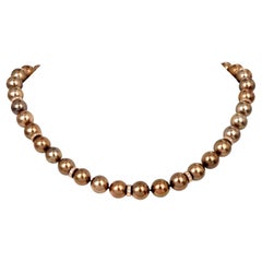 Collier de perles de Tahiti brunes et dorées, diamantées, en or rose 18K