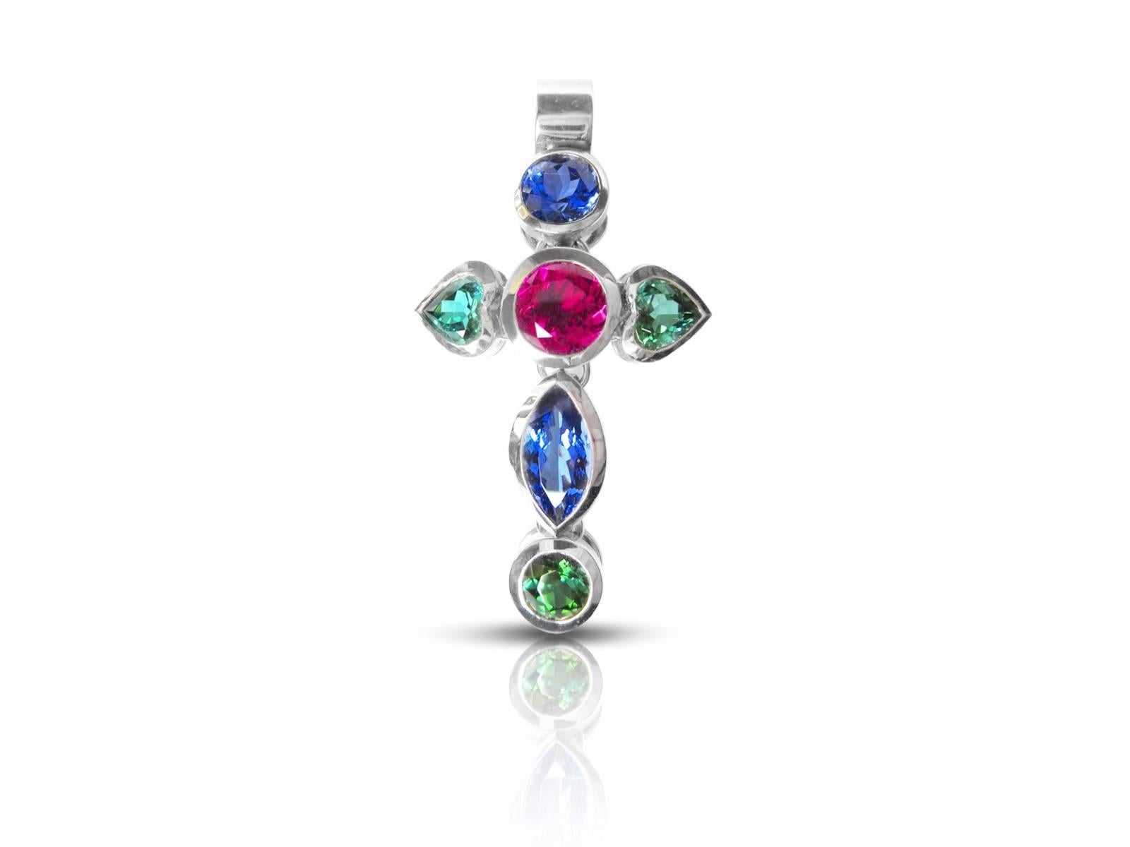 Thomas Leyser is renowned for his contemporary jewellery designs utilizing fine coloured gemstones and diamonds.  

This cross pendant in 18k white gold (14.5g) is set with various fine gemstones (Tanzanites - 3.68ct, Tourmalines - 2.38ct,