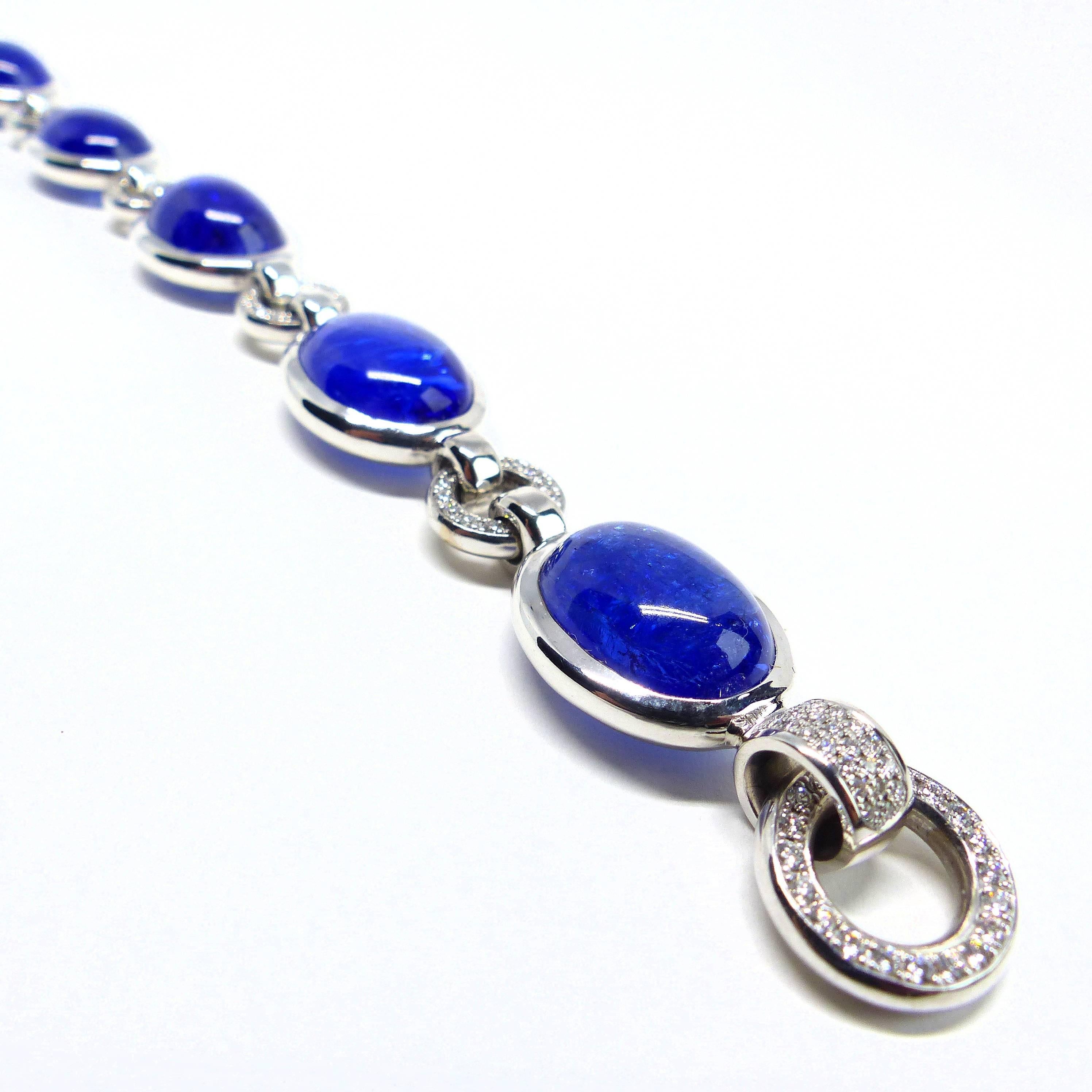 Thomas Leyser is renowned for his contemporary jewellery designs utilizing fine gemstones. 

This 18k white gold (46.11g) bracelet is set with six top quality Tanzanite Cabouchons (60.72cts. in total). It is accentuated by 61 diamonds pavé brillant