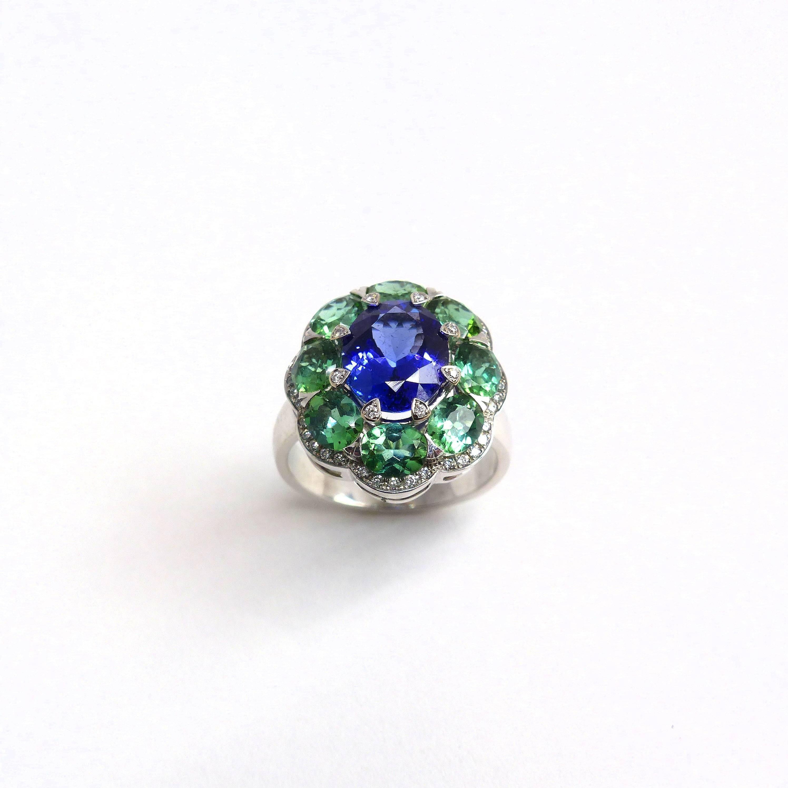 Oval Cut Ring in White Gold with 1Tanzanite and 8 Tourmalines and Diamonds. For Sale