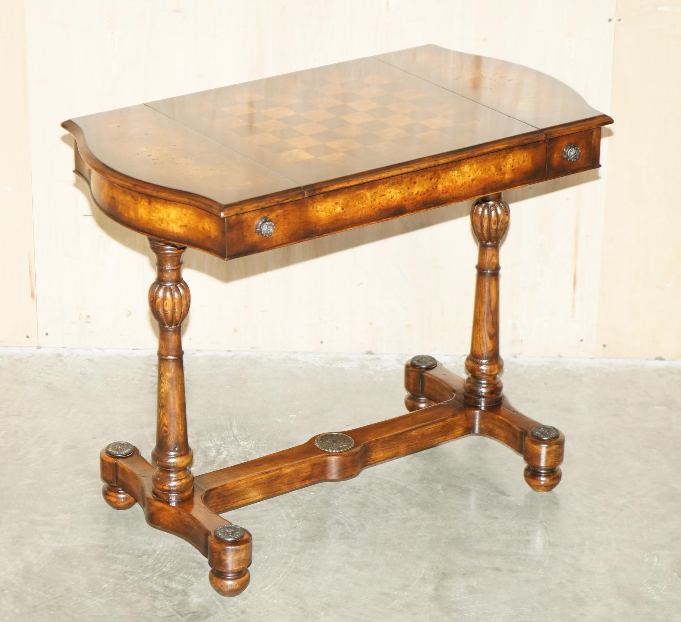 Royal House Antiques

Royal House Antiques is delighted to offer for sale this absolutely exquisite vintage Theodore Alexander burr walnut and brown leather chess backgammon card games table with changeable top based on a Regency sofa table design
