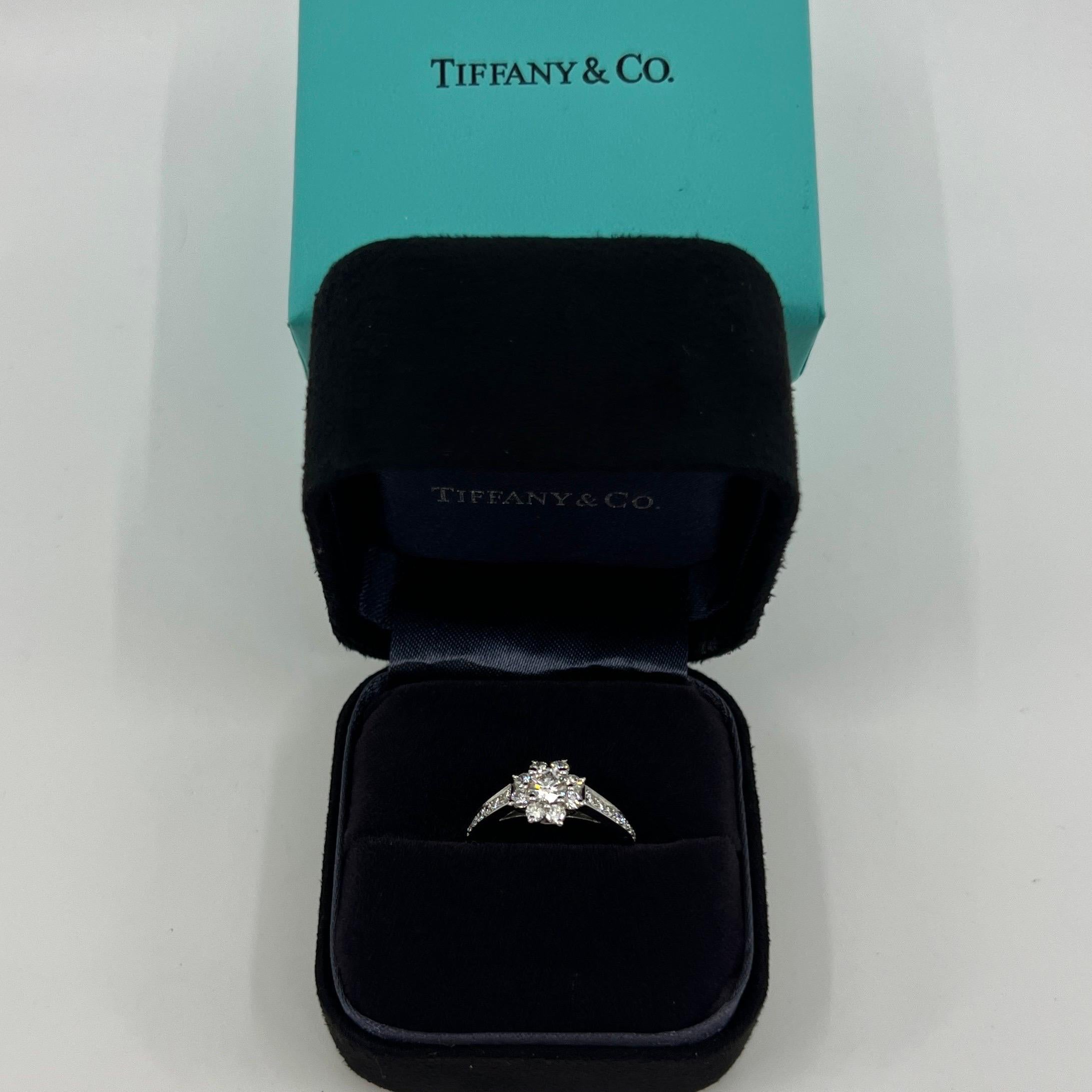 Vintage Tiffany & Co. Diamond Flower Buttercup 950 Platinum Ring.

A beautifully made platinum cluster ring set with excellent quality natural white diamonds. Superb cut, clarity and colour - as to be expected by Tiffany & Co.

The ring features a