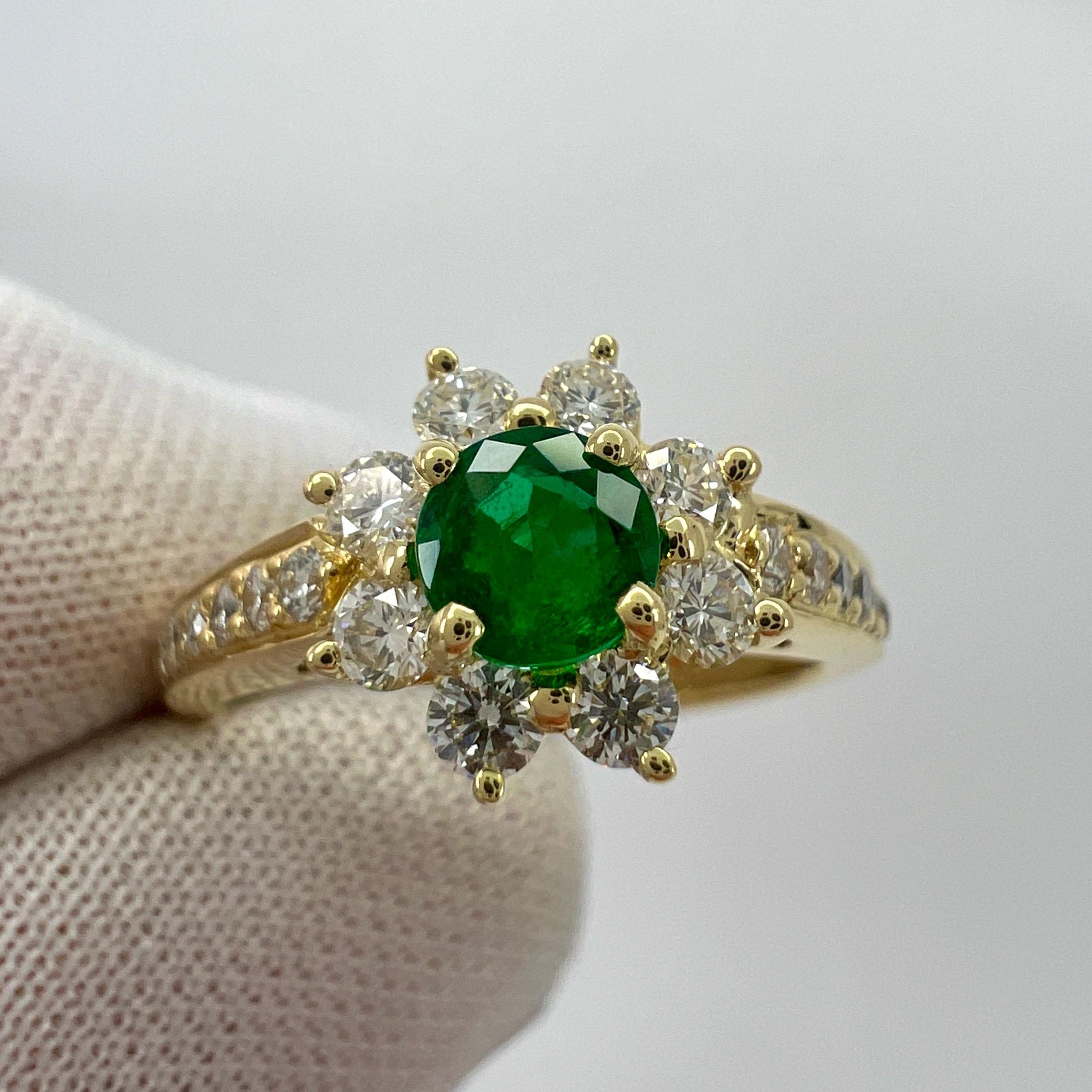 Rare Tiffany & Co. Emerald & Diamond Buttercup 18k Yellow Gold Ring.

A beautifully made yellow gold cluster ring set with a stunning 4.2mm (approx. 0.30ct) vivid green round cut emerald. Superb colour, clarity and cut. Colour looks much better in