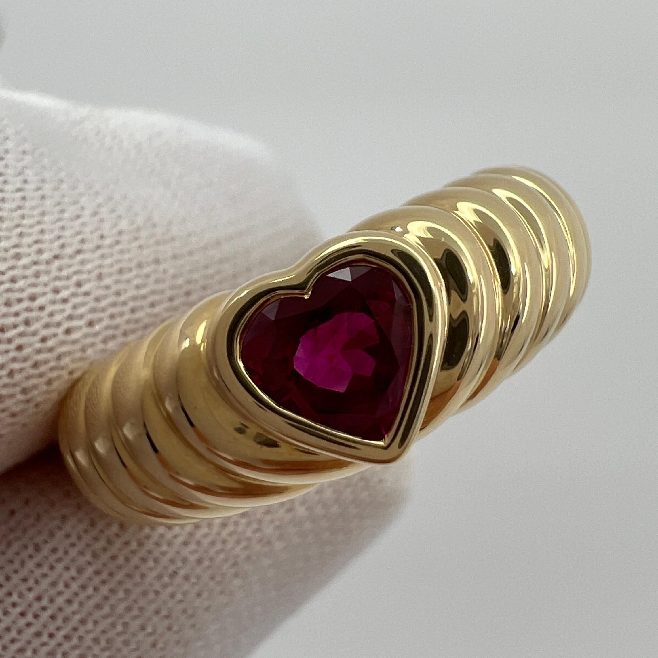 Rare Tiffany & Co. Vivid Blood Red Ruby Heart Cut 18k Yellow Gold Band Ring.

A beautifully made yellow gold ring set with a stunning vivid blood red heart cut ruby. Superb colour, clarity and cut. Approx. 0.80 carat in weight, a fine top grade