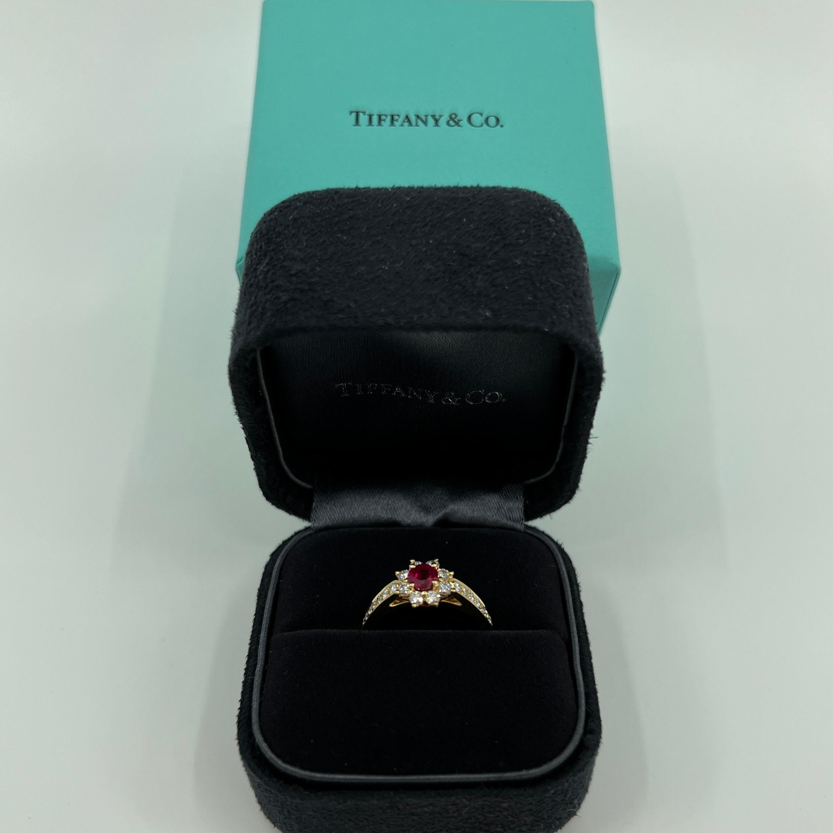 Rare Tiffany & Co. Ruby & Diamond Buttercup 18k Yellow Gold Ring.

A beautifully made yellow gold cluster ring set with a stunning 4.2mm (approx. 0.40t) deep vivid red round cut ruby. Superb colour, clarity and cut. 
Surrounded by 8 white diamonds