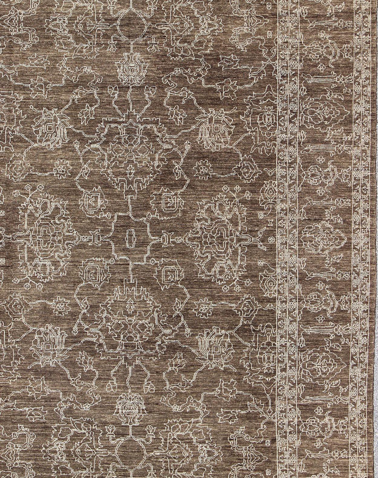 Keivan Woven Arts -Variegated brown and tan in this very finely woven Transitional rug made in Turkey with tan highlights, rug AN-110430, country of origin / type: Turkey / Tribal

This fine Turkish rug features a transitional design of stylized