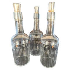 Fine Trio of American Silver Overlay and Etched Art Deco Back Bar Bottles