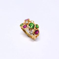 Ring in Rose Gold with Tsavorite and Rubelites and Diamonds.