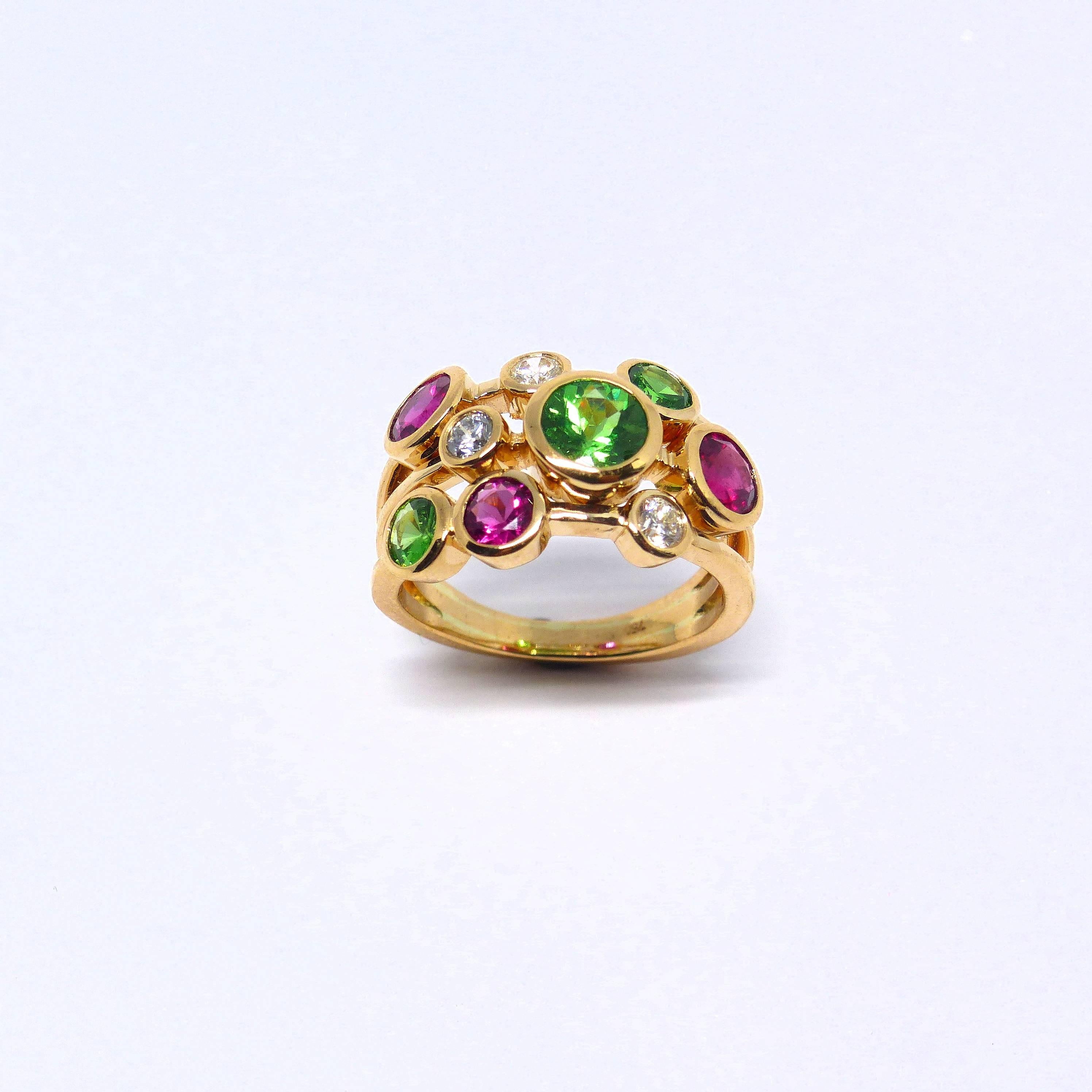 Contemporary Ring in Rose Gold with Tsavorite and Rubelites and Diamonds. For Sale