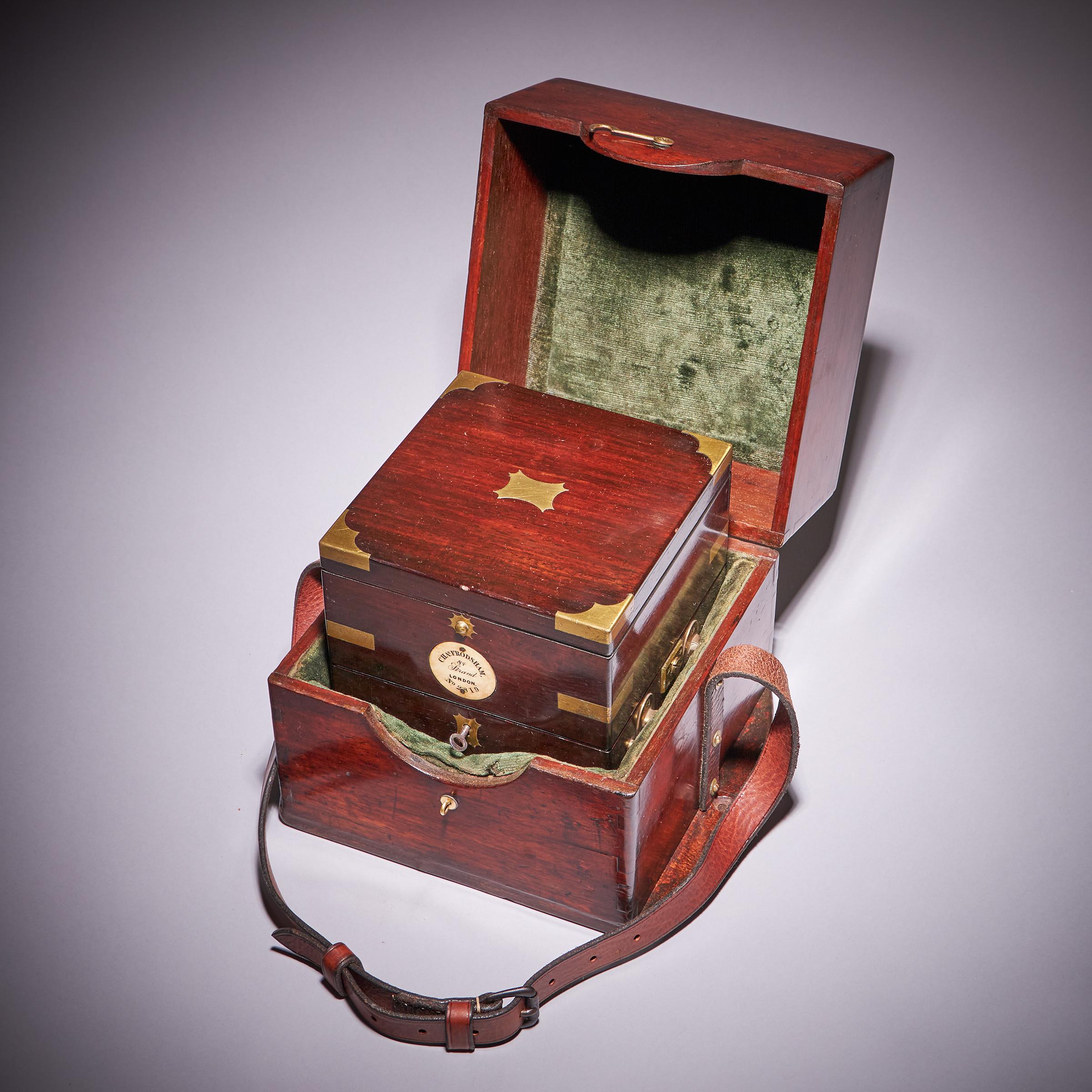 A Sturdy English Two-Day Marine Chronometer  Made by the Renowned Maker Charles Frodsham, c. 1860

A classic expertly produced 19th century English chronometer in a three-tier rosewood case, made c. 1860. The typically brass bound case consists of a
