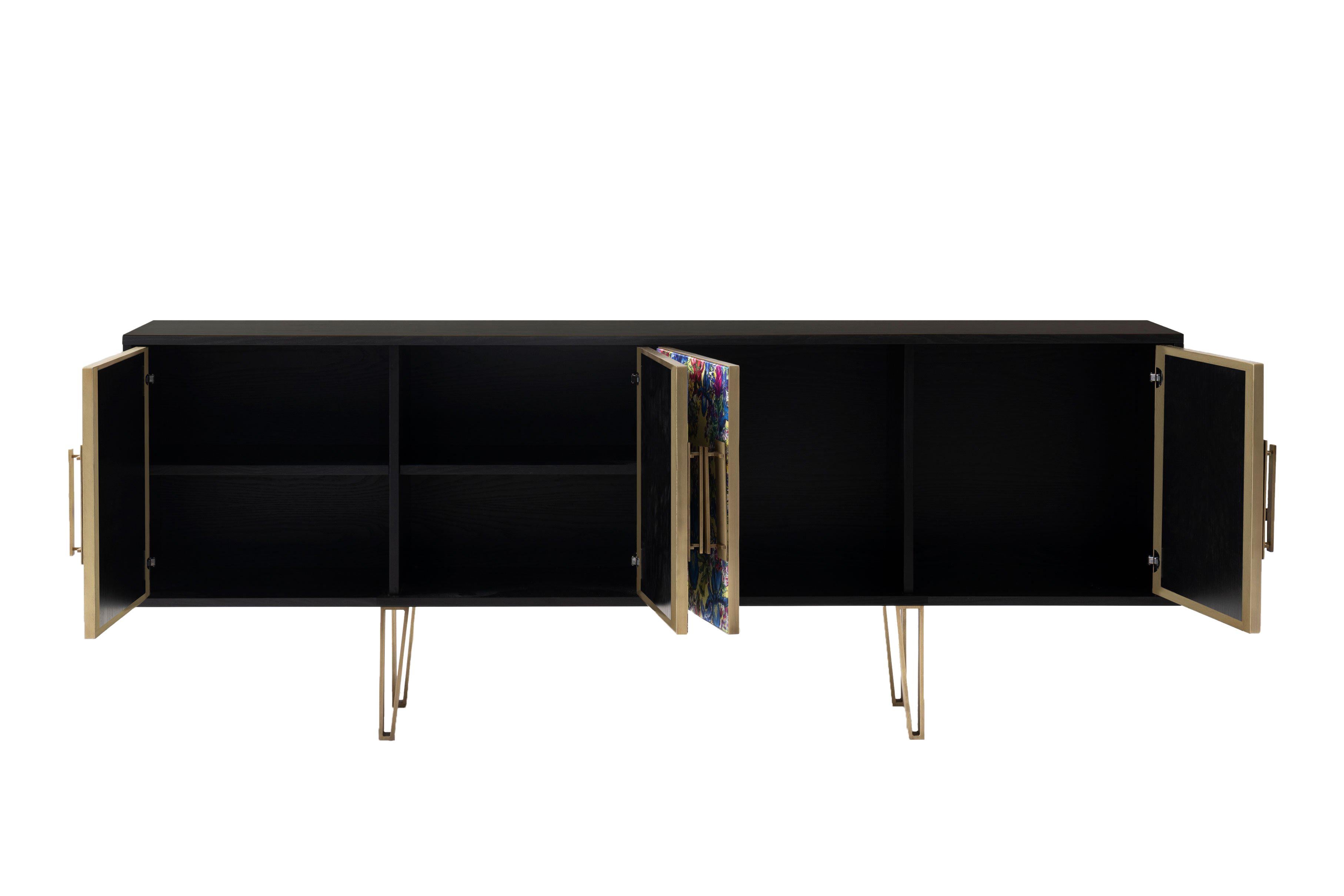 Upholstered FELDER FELDER’S stunning electric blue print, the Blake sideboard combines luxurious design with generous storage.

Handcrafted in England from lacquered oakwood veneers, this statement piece is fine upholstered in sumptuous silk-blend