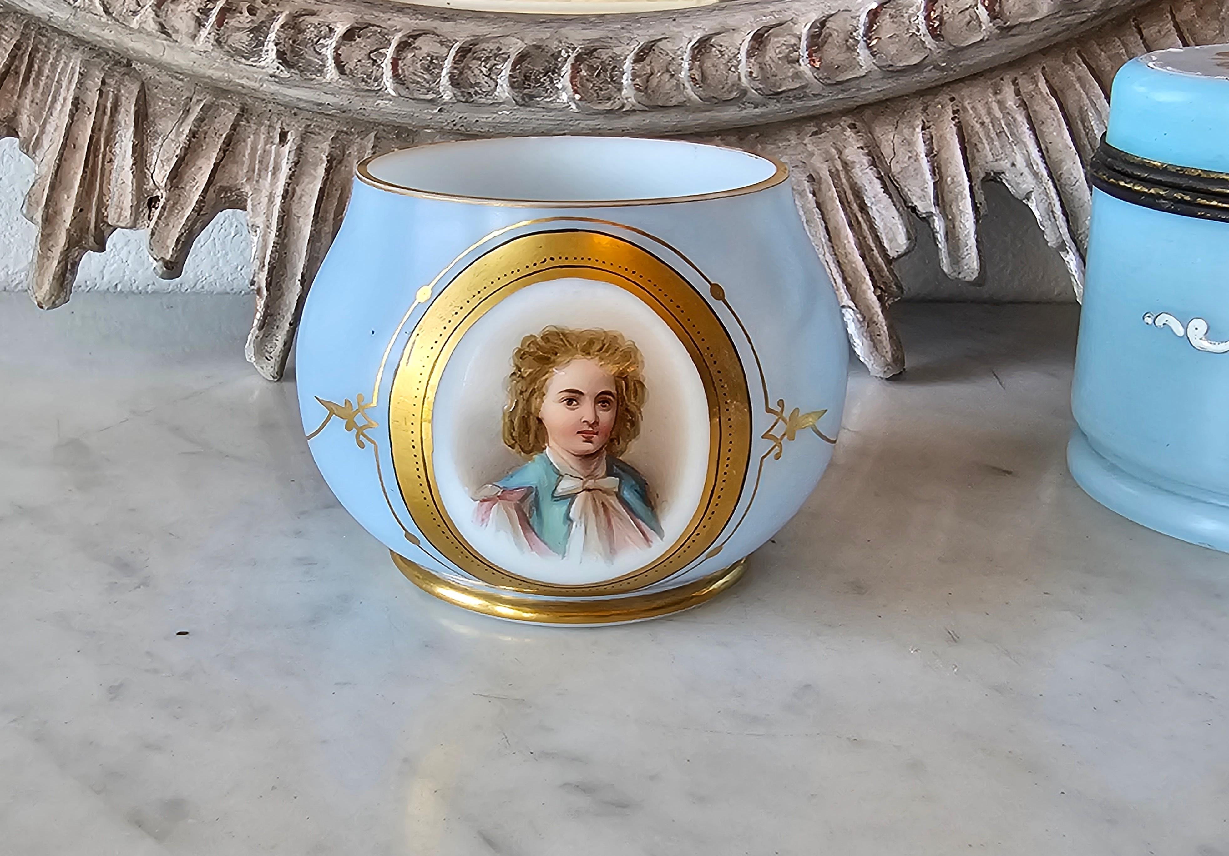 A beautiful 19th century Victorian era blown opaline glass hand-painted parcel gilt dresser cache pot. 

Elegant, sophisticated and luxurious, French Sèvres taste, hand-blown pale robin's egg milky blue opaline glass with pontil scars, diminutive