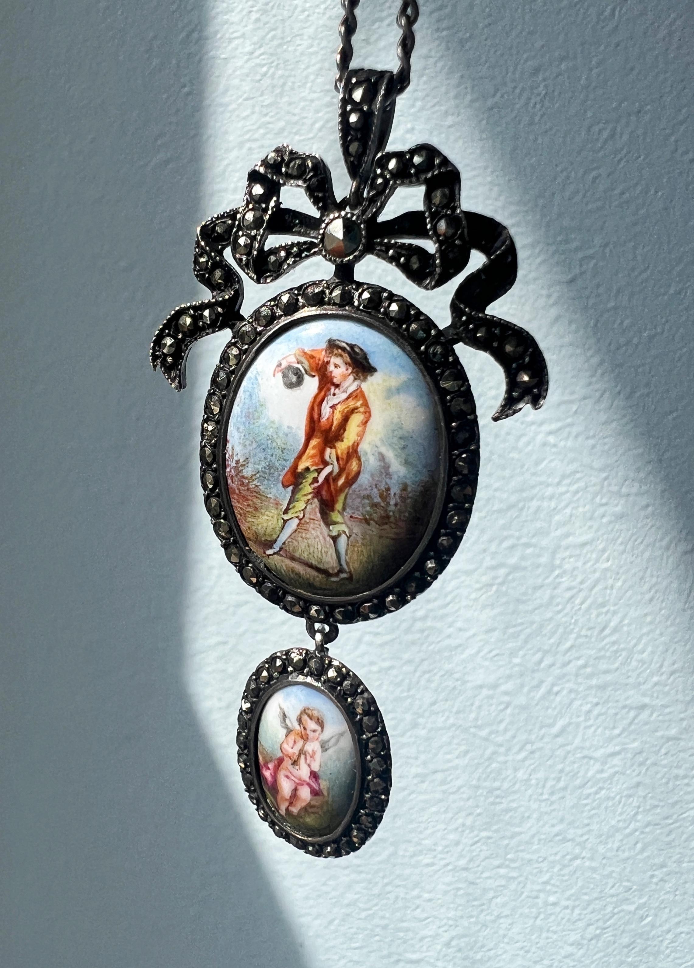 For sale an exquisite Victorian-era antique pendant, a true marvel of artistry and sentimentality. This pendant showcases two incredibly detailed miniatures suspended delicately from a captivating bow. Dating back to the 19th century, this pendant