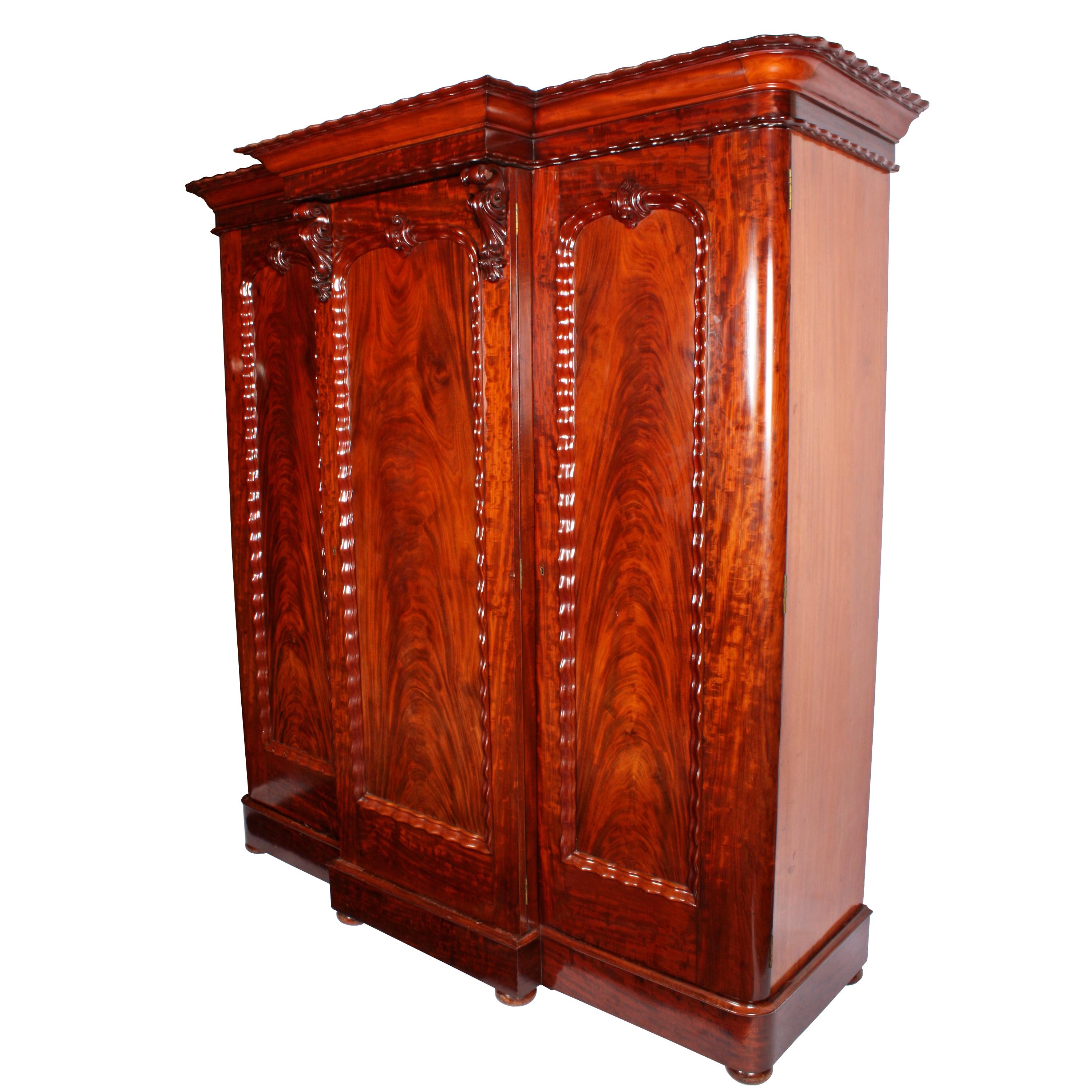 Fine Victorian mahogany wardrobe


A very good example of a mid-19th century Victorian mahogany three-door breakfront wardrobe.

The robe is made from mahogany with the finest figured mahogany veneers used for the door fronts which have