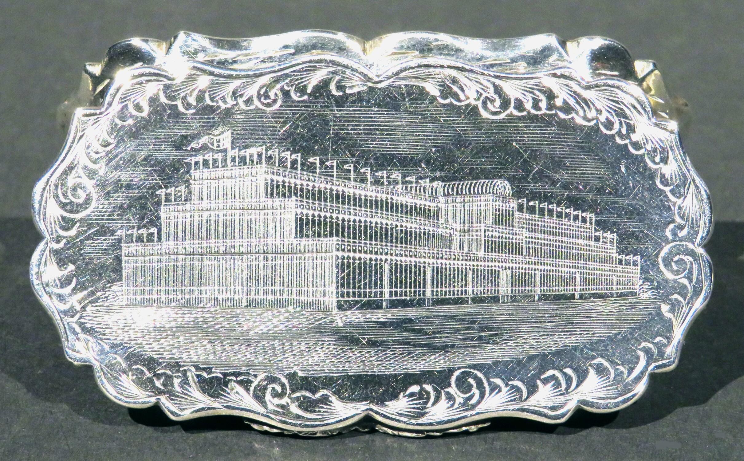 A fine and rare 19th century sterling silver snuff box made specifically for the Great Exhibition of 1851, held at the Crystal Palace in London. 
The lid shows a finely detailed engraved image of the Crystal Palace surrounded by a border of hand