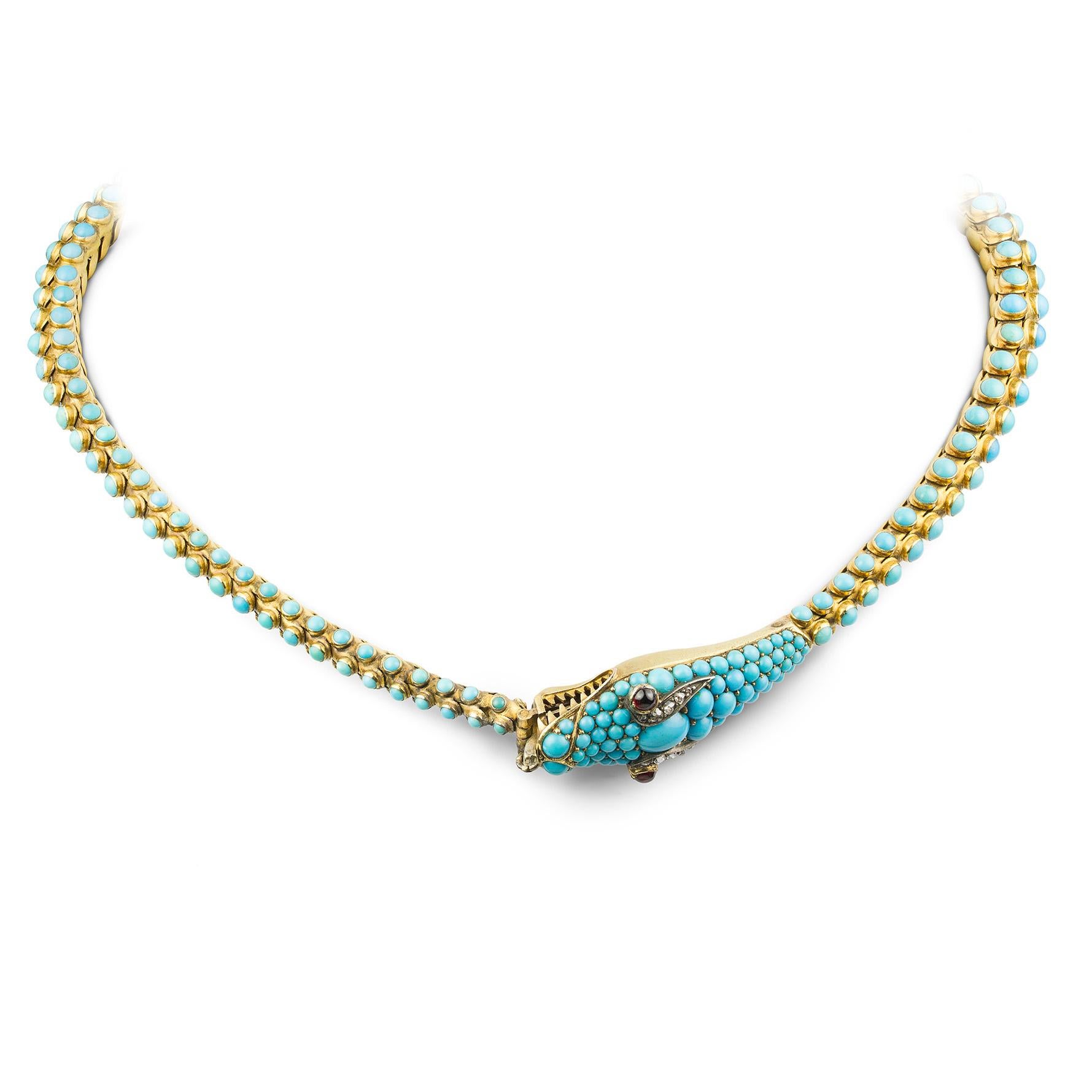 A fine Victorian turquoise serpent necklace, the flexible tapering yellow gold body formed of three rows of scale-like collet-set turquoise cabochons, the head decorated with rose-cut diamond brows, garnet eyes and yellow gold teeth, approximate