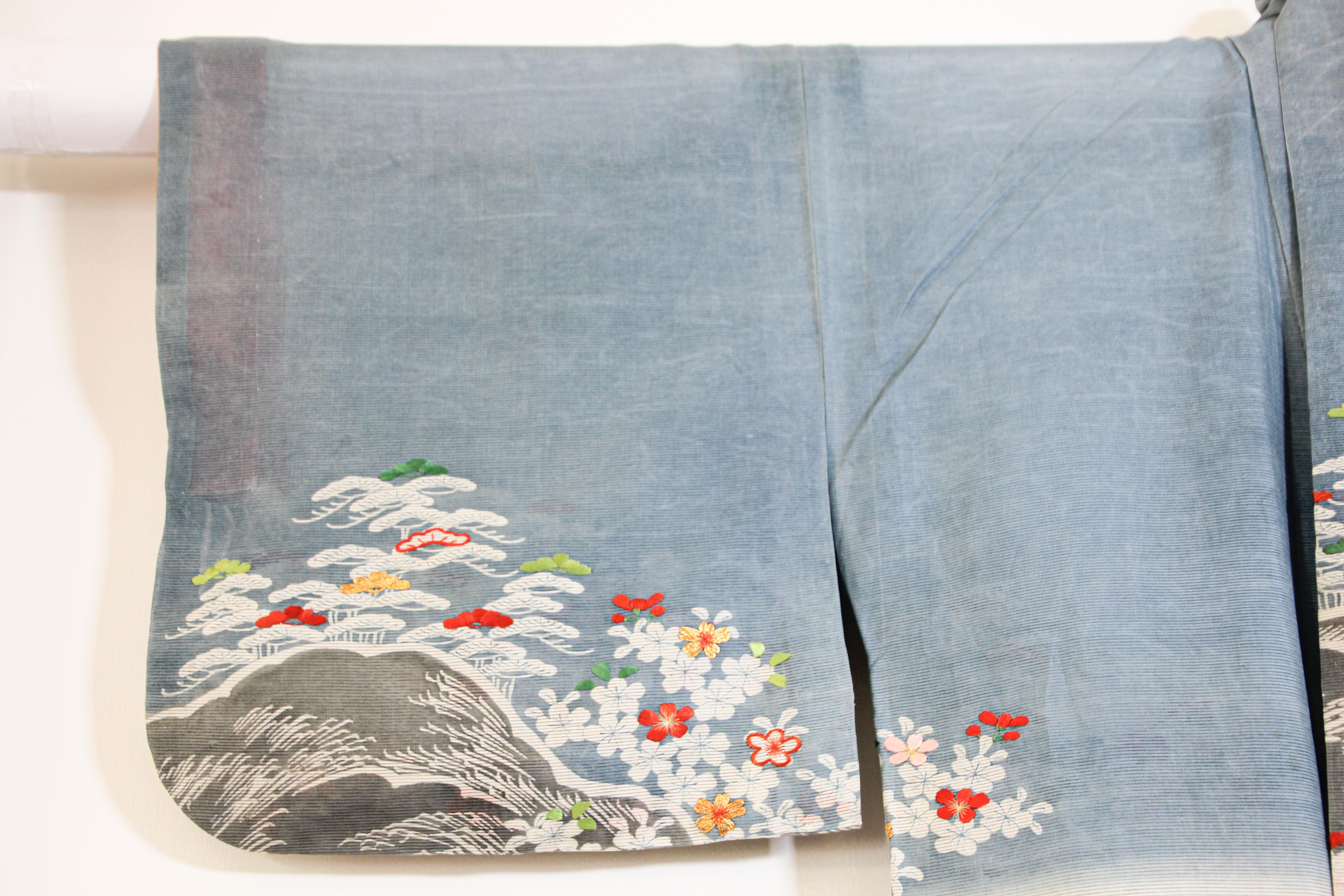 This vintage summer weight or lightweight blue raw silk Japanese Kimono is embroidered with gold thread, red, green and pink details.
A fine Japanese Kuro Tomesode Kimono.
Hand painted and hand sewn in Japan,
circa 1950s.
Total width
