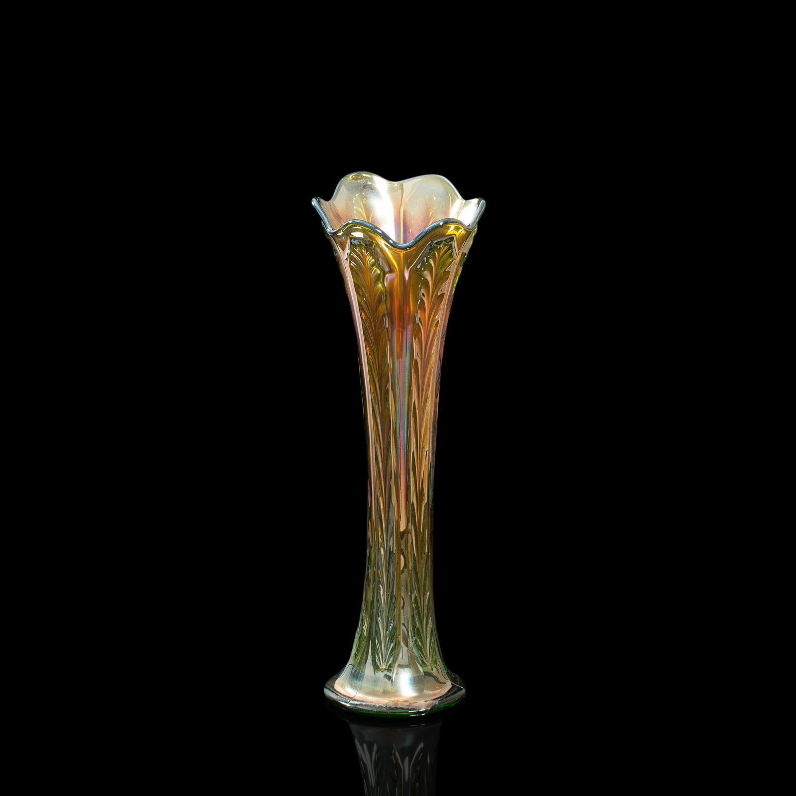 This is a fine vintage carnival vase. An English, glass decorative flower vase with lustre finish, dating to the mid 20th century, circa 1930.

Radiant hues with superb detailing
Displaying a desirable aged patina and in good original
