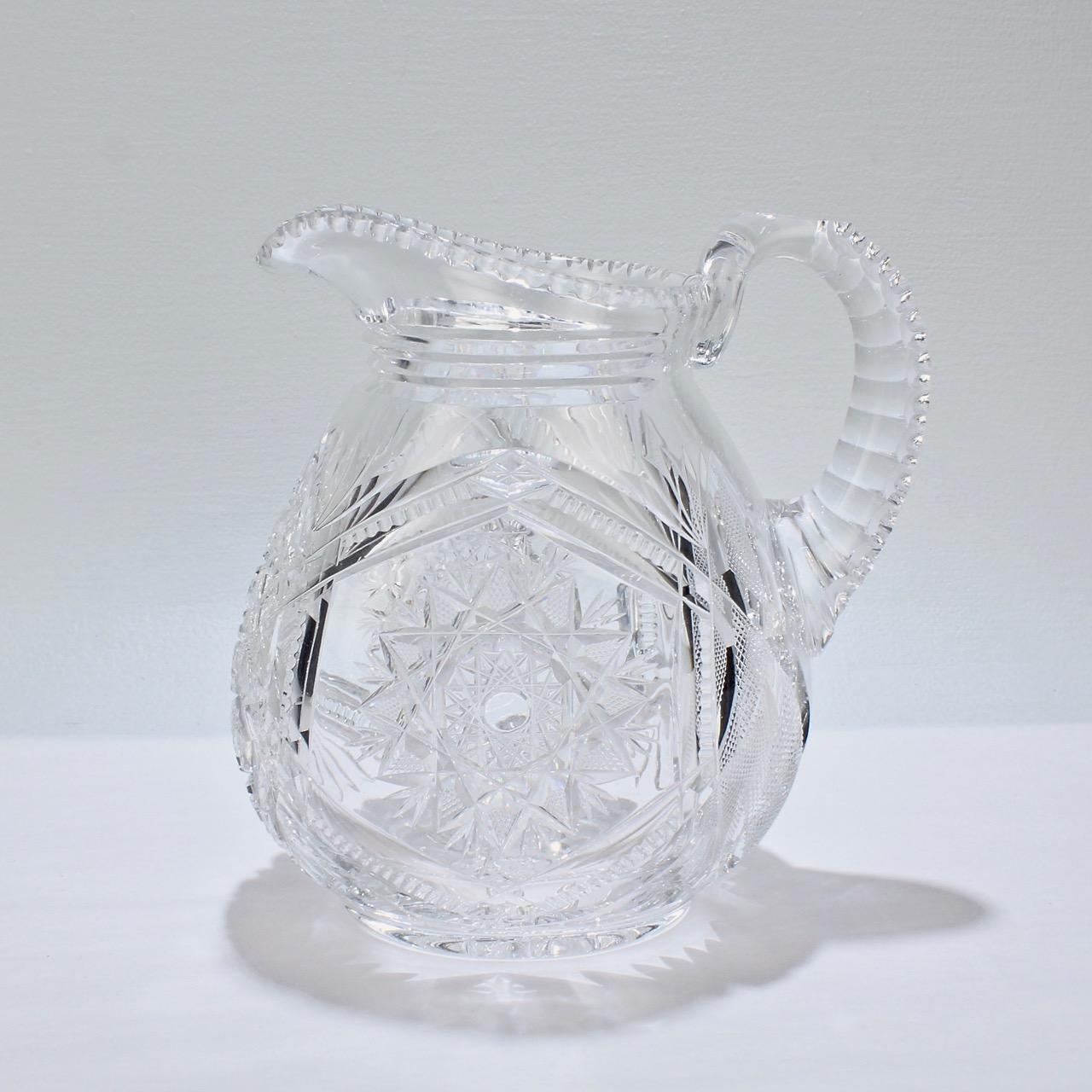 A very fine old or antique cut glass pitcher.

Possibly American in origin and dating as early as the American Brilliant Period. 

With deep wheel cut decoration, an atypically narrow body, and sturdy applied handle.

Simply a wonderful variant on