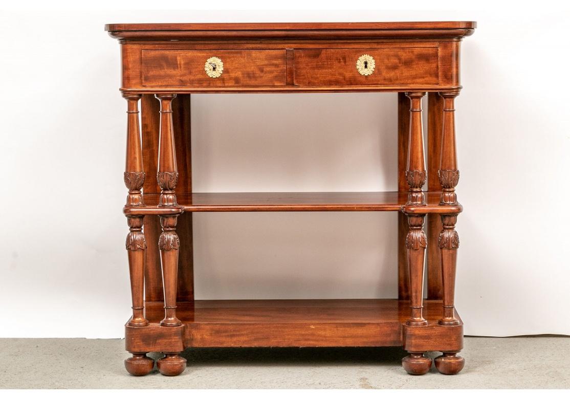 Possibly by Jac. Van den Bosch (1868-1948) who worked in various woods in different styles, many in the early 20th century into the 1920s. A three- tiered server with an overhanging lift up top, opening to two folding back shelves. The two short