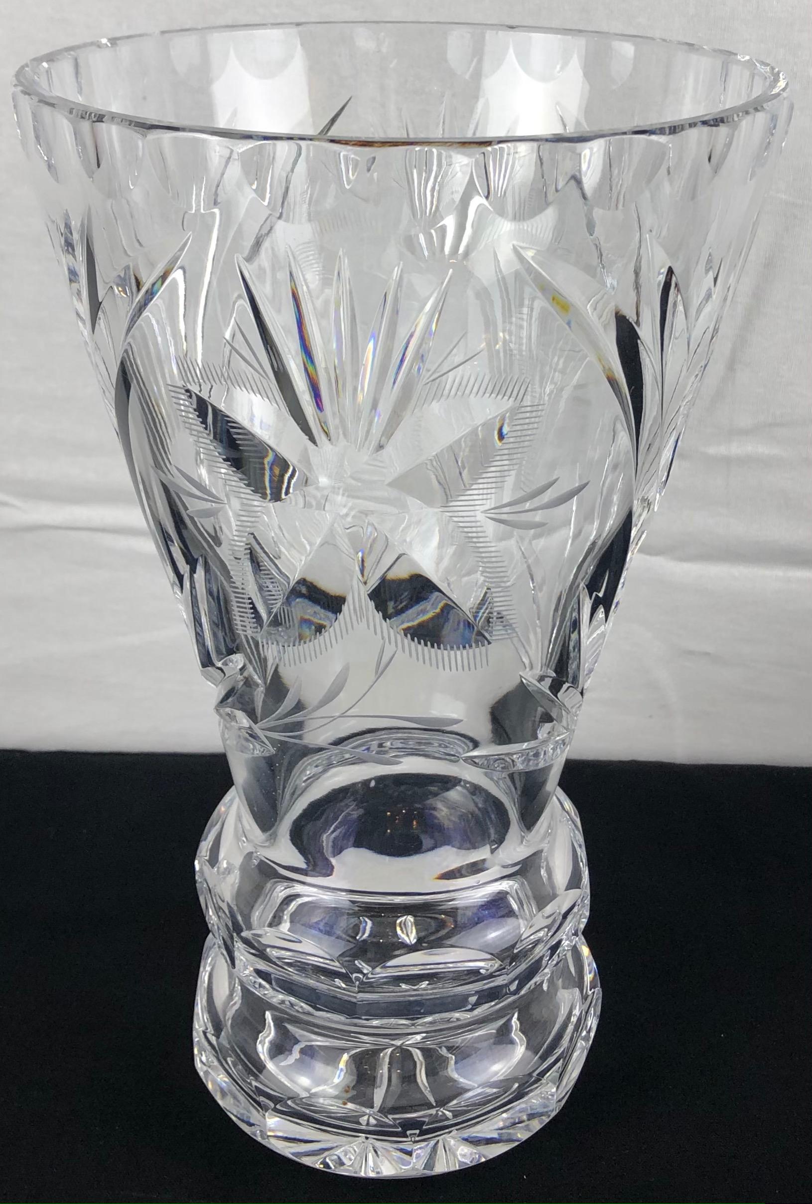 A fine French crystal vase that varies with a simple design to extraordinary details.
Delightfully heavy, very good quality crystal that chimes beautifully when tapped. 

Perfect condition. No chips or cracks. 
Diameter noted is at the widest
