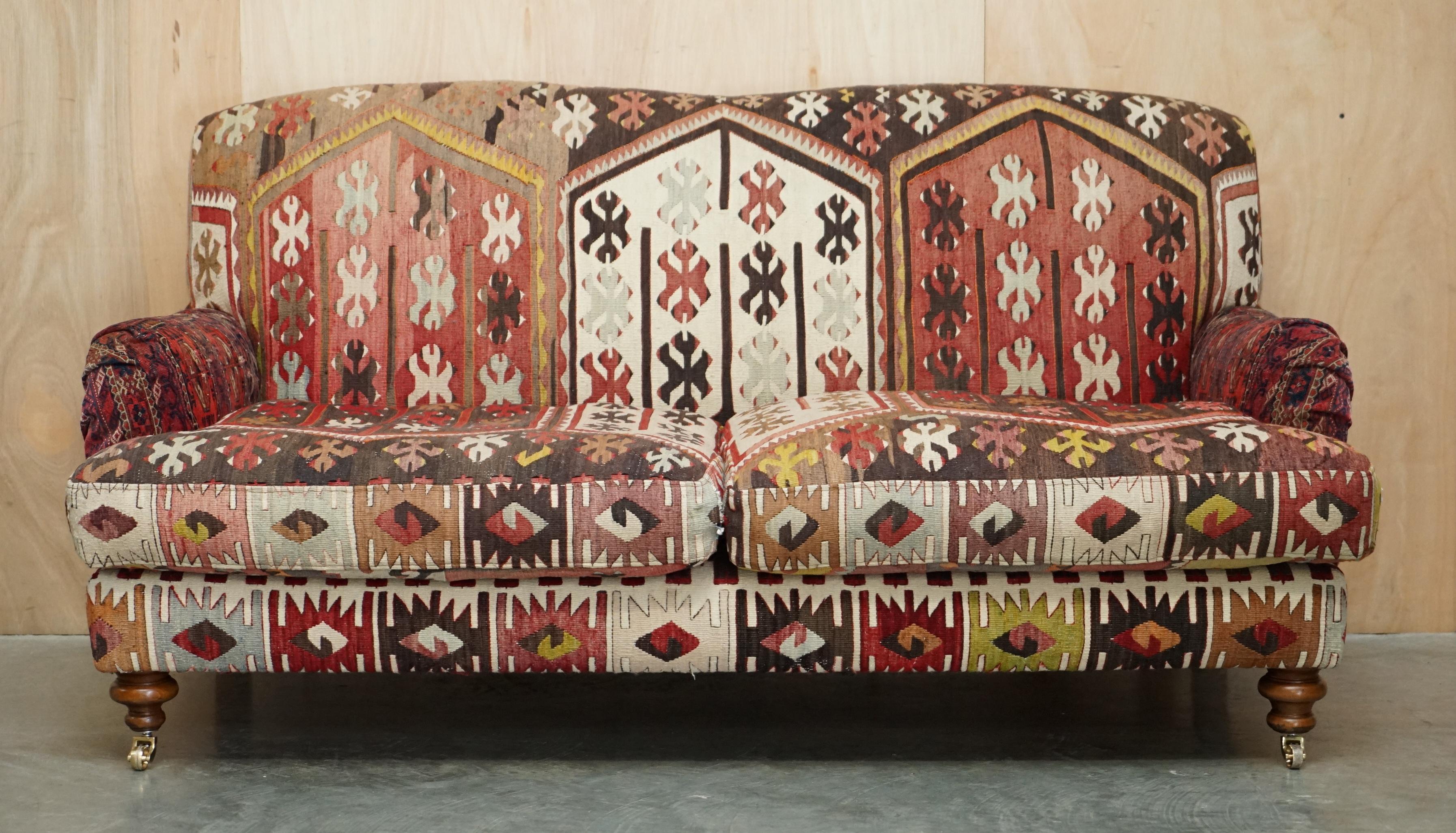 Royal House Antiques

Royal House Antiques is delighted to offer for sale this sublime George Smith / Howard & Son's style, signature scroll arm two-seat sofa upholstered with Aztec Kilims

Please note the delivery fee listed is just a guide, it