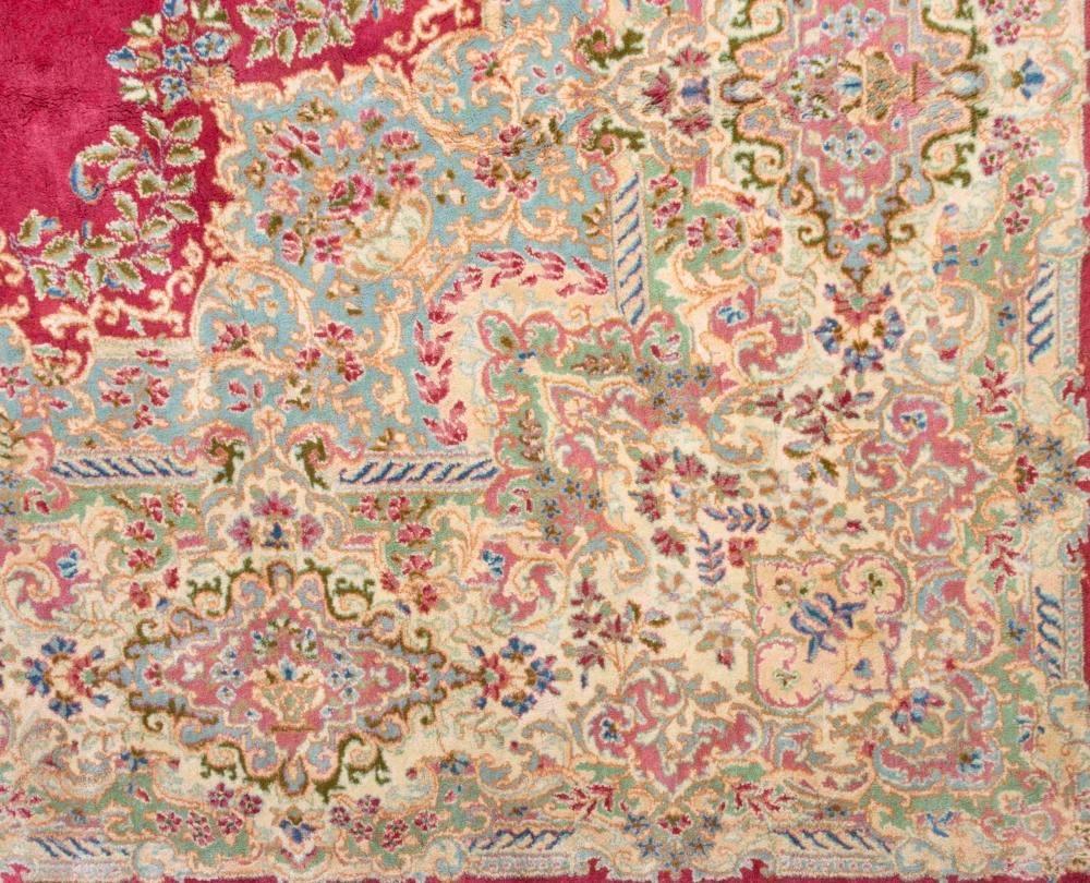 Fine Vintage Kirman Persian Wool Rug 1960s, Red Medallion, Hand Knotted
Measures: 8 feet x 10 feet. 

Gorgeous vibrant red center medallion surrounded by lush, intricate field of beige, light blue, green and pink. Great contrast. 
 Kerman carpets