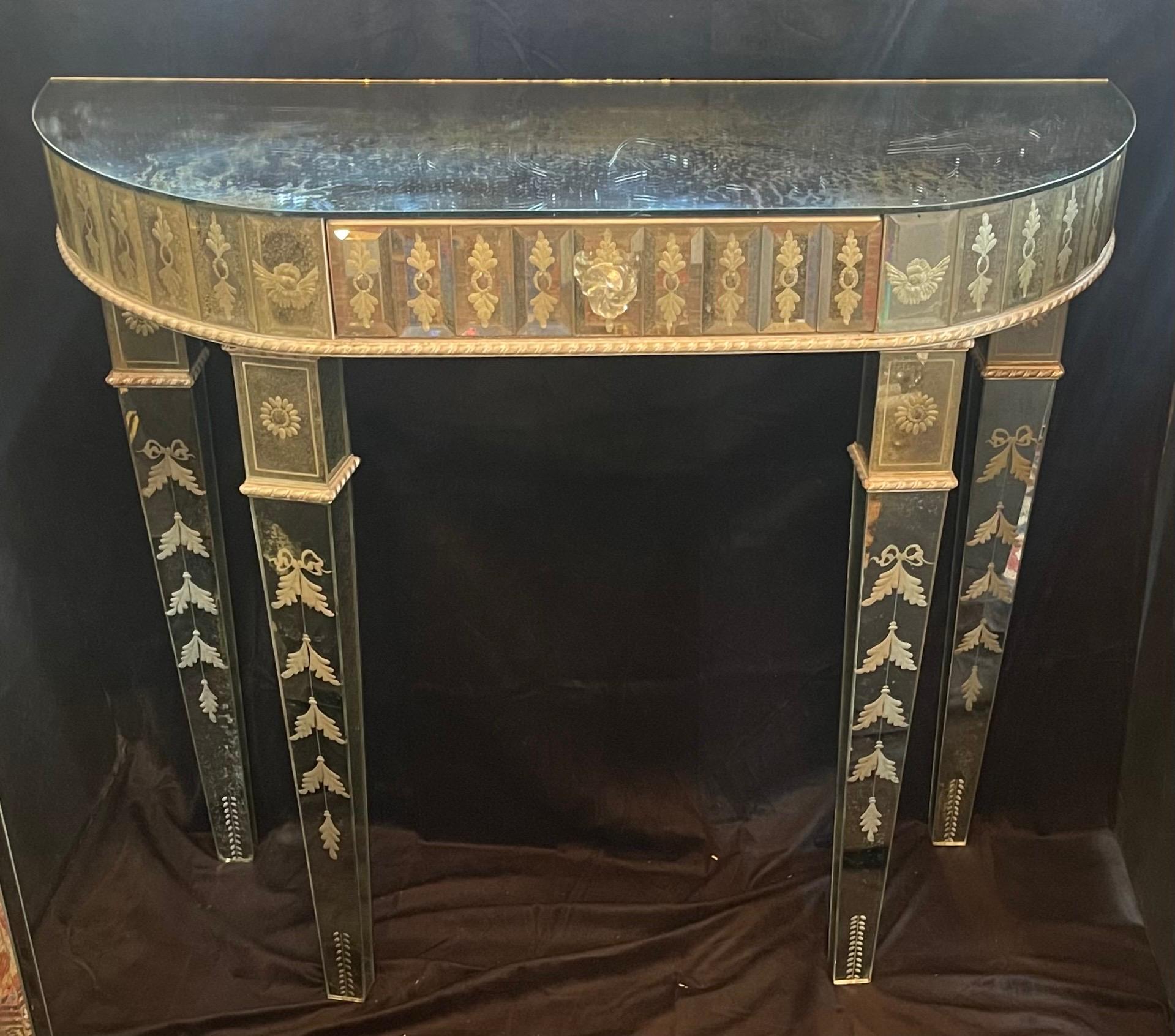 A very fine vintage Venetian etched demilune console table finished all the way around Retailed by Lorin Marsh.