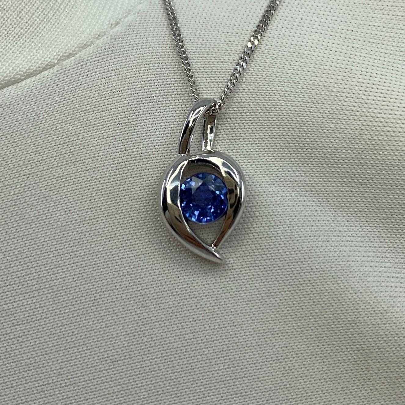 Fine Vivid Blue Ceylon Sapphire Round Cut 18k White Gold Solitaire Drop Pendant.

0.60 Carat sapphire with a beautiful vivid blue colour and excellent clarity, very clean stone. Also has an excellent round brilliant cut showing lots of light return
