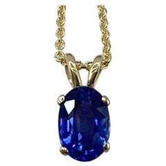 Fine Vivid Blue Oval Cut Sapphire Yellow Gold Solitaire Pendant Necklace