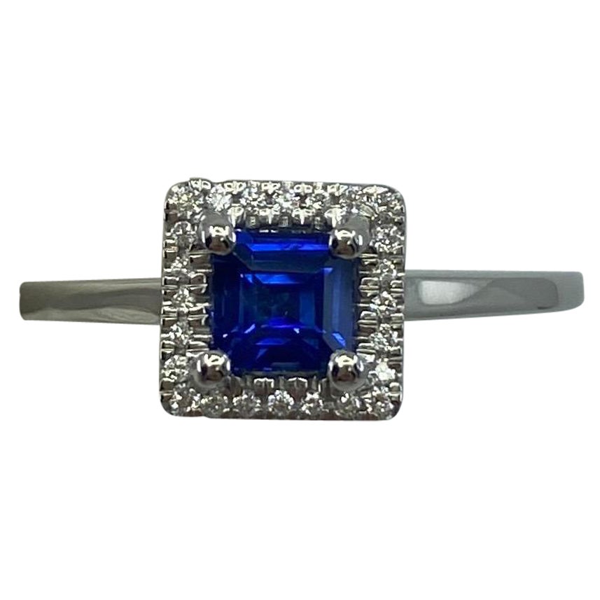 Halo-Ring mit Prinzessinnenschliff, lebhaftes Ceylon-Blauer Saphir 
Diamant 950 Platin