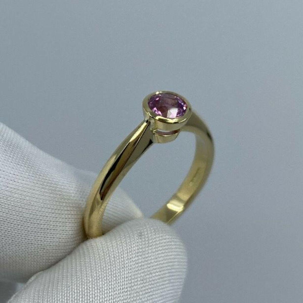 Fine Vivid Pink Sapphire Round Cut 18K Yellow Gold Solitaire Rubover Bezel Ring For Sale 1