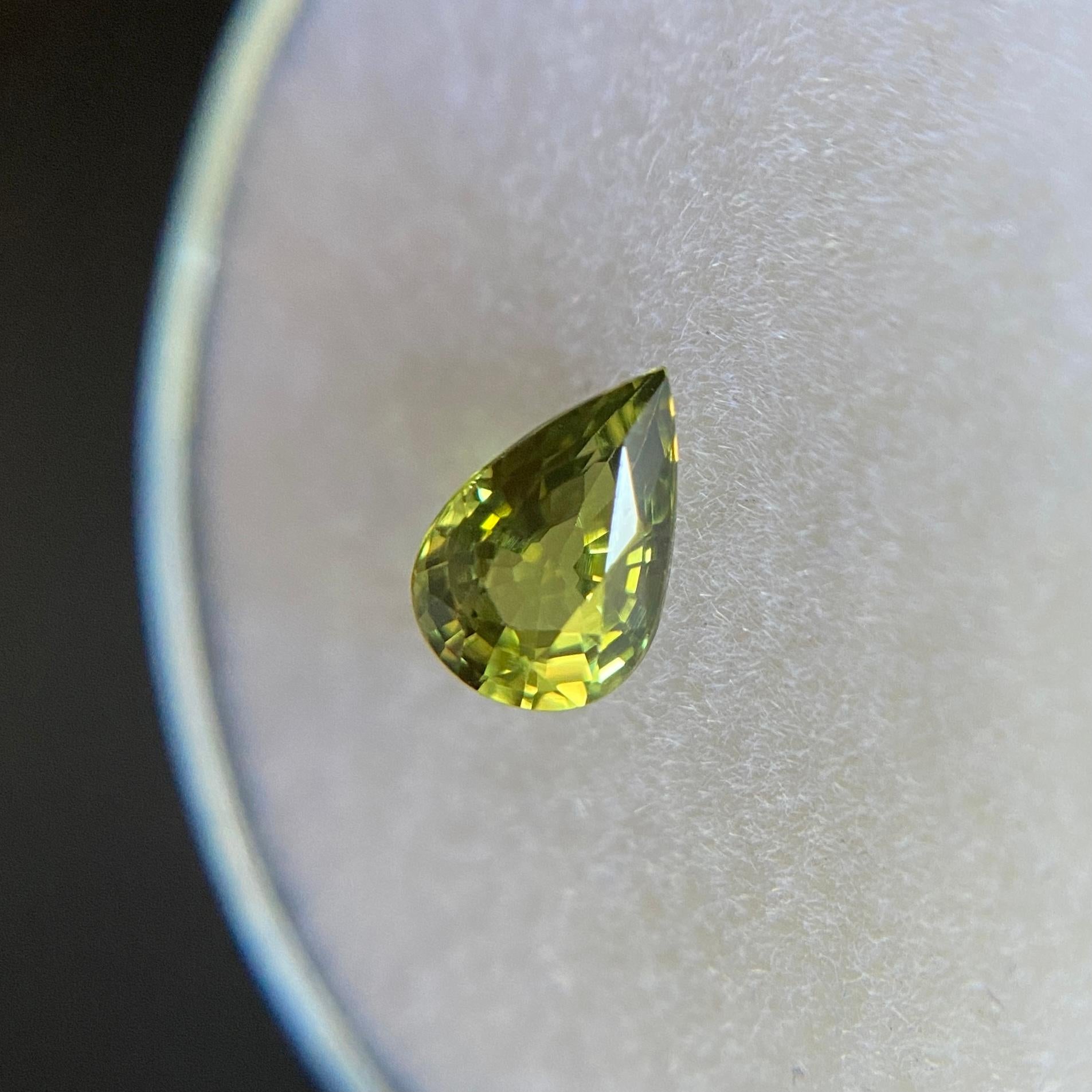 Fine Vivid Yellow Green Australian Sapphire 0.60ct Pear Cut Untreated 3
