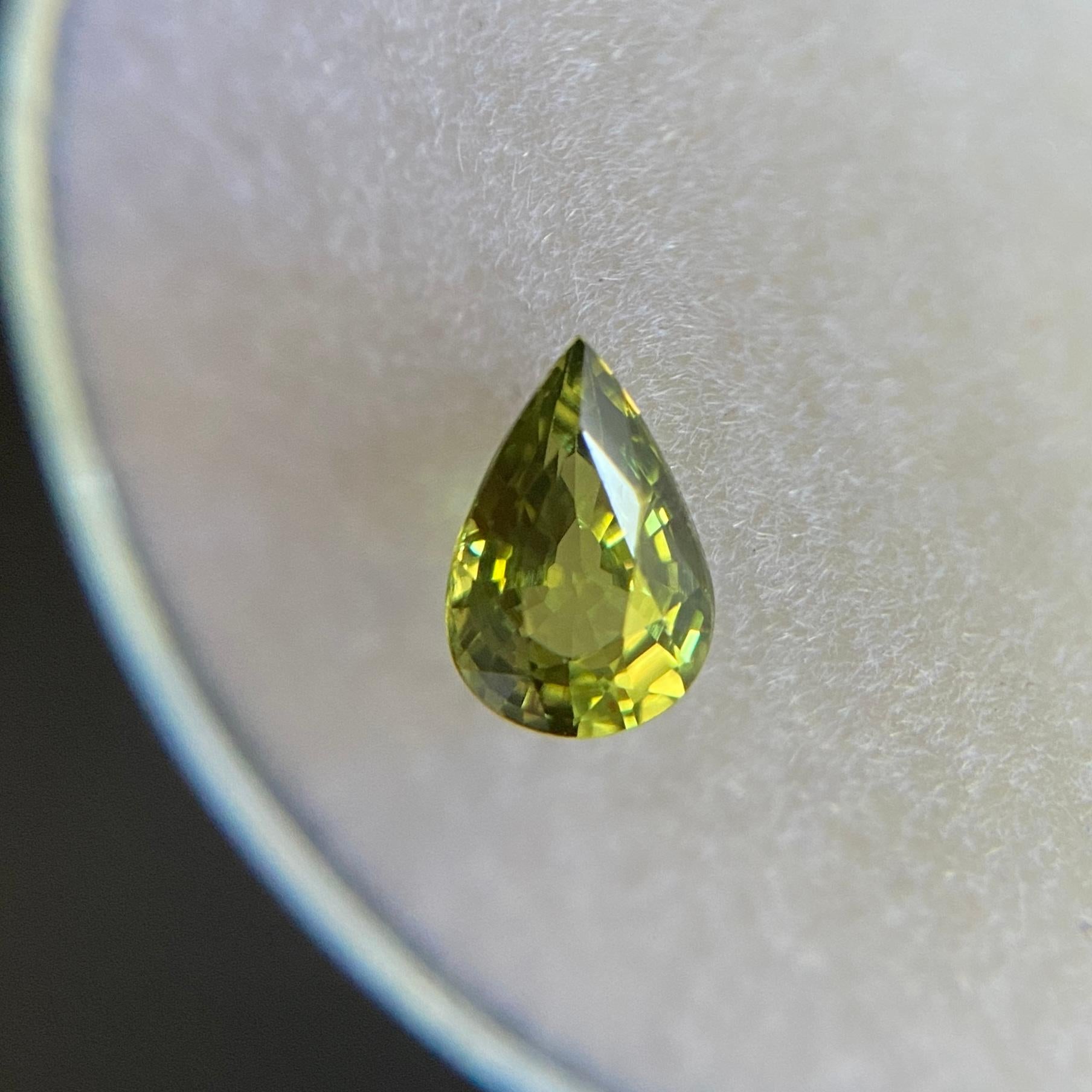 Fine Vivid Yellow Green Australian Sapphire 0.60ct Pear Cut Untreated 4