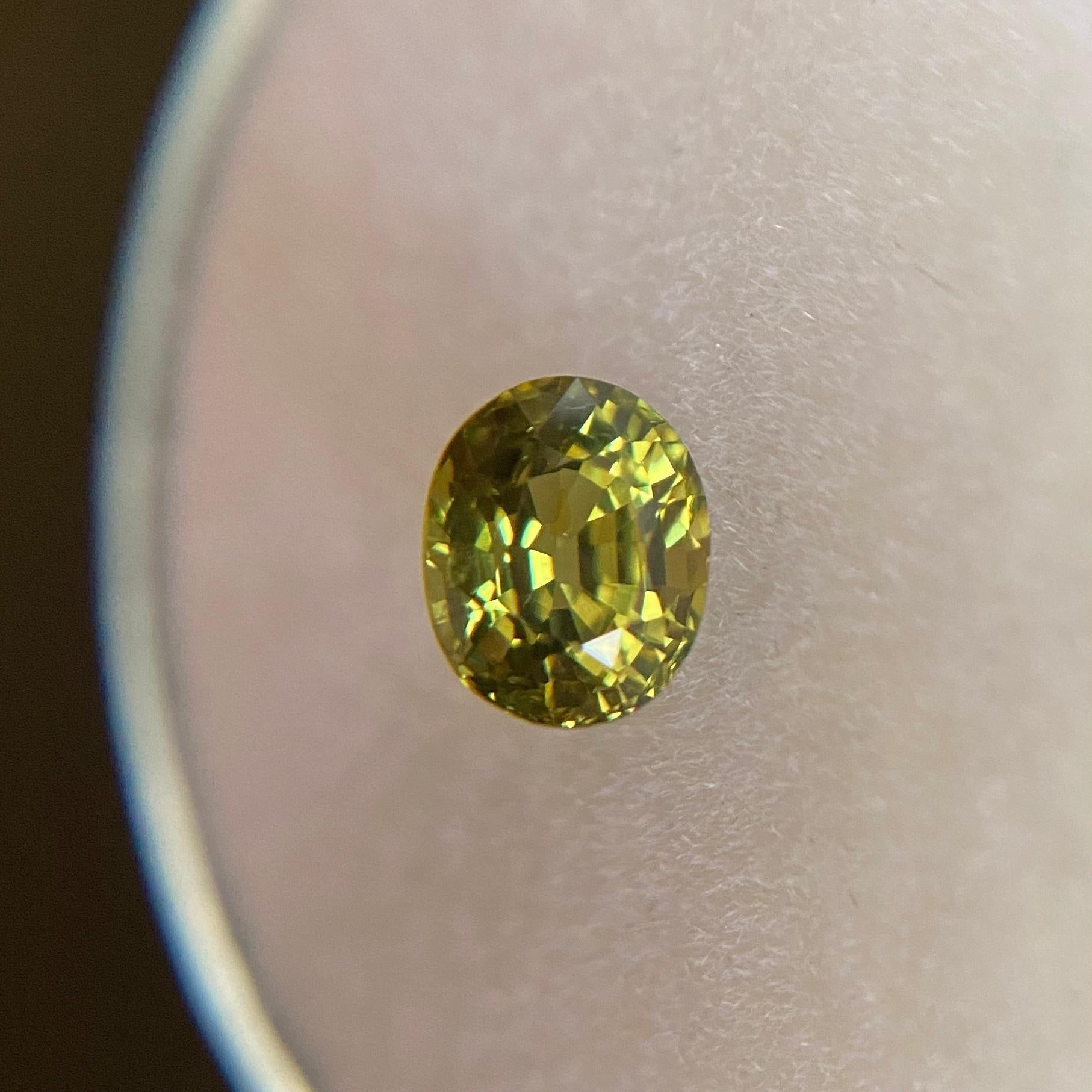 FINE Vivid Yellow Green Australian Sapphire Oval Cut 0.80ct UNTREATED 5.5x4.4mm In New Condition For Sale In Birmingham, GB