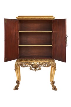 Fine Walnut &  carved Gilded 2 door cabinet on stand