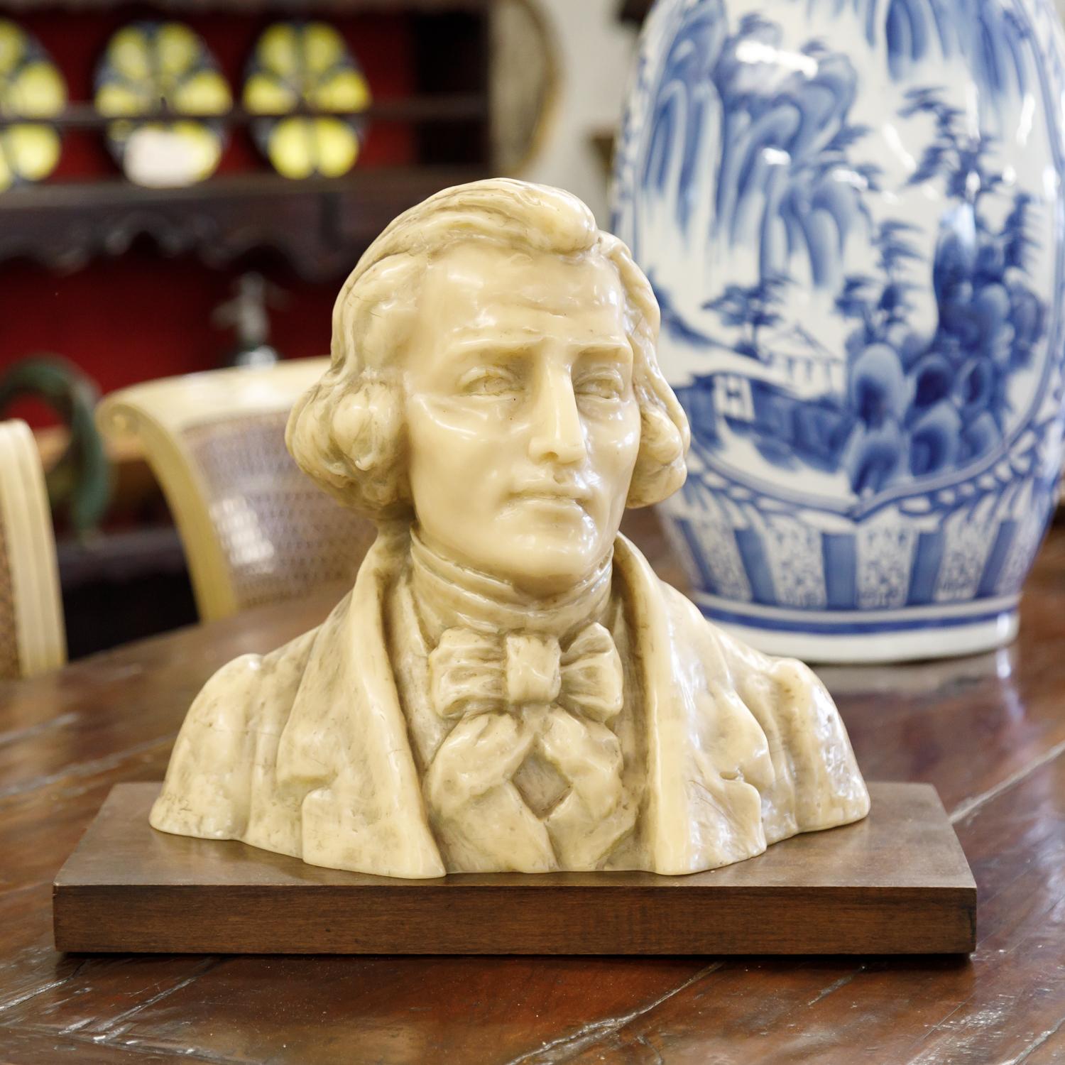 A fine 19th century wax bust of Hungarian composer Franz Liszt by French sculptor Paul Gaston Déprez, circa 1890s. This rare wax sculpture features a beautiful, lifelike facial expression and fine detail all around. Signed 