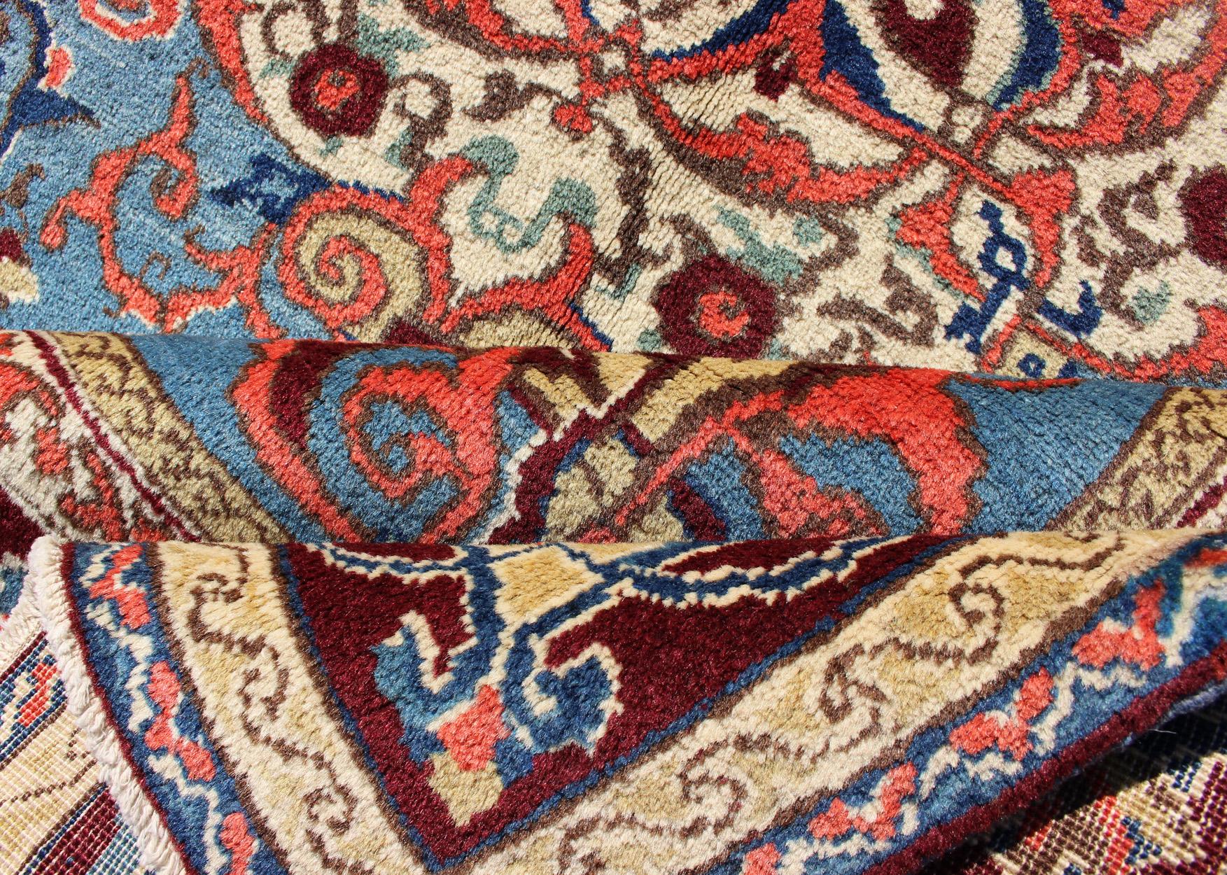 Hand-Knotted Antique Sivas Fine Rug with Blue Background Wine Border and Intricate Design For Sale