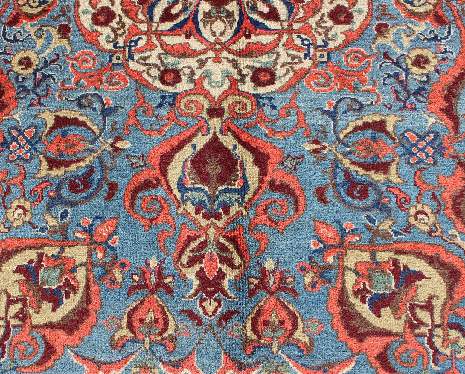 Wool Antique Sivas Fine Rug with Blue Background Wine Border and Intricate Design For Sale