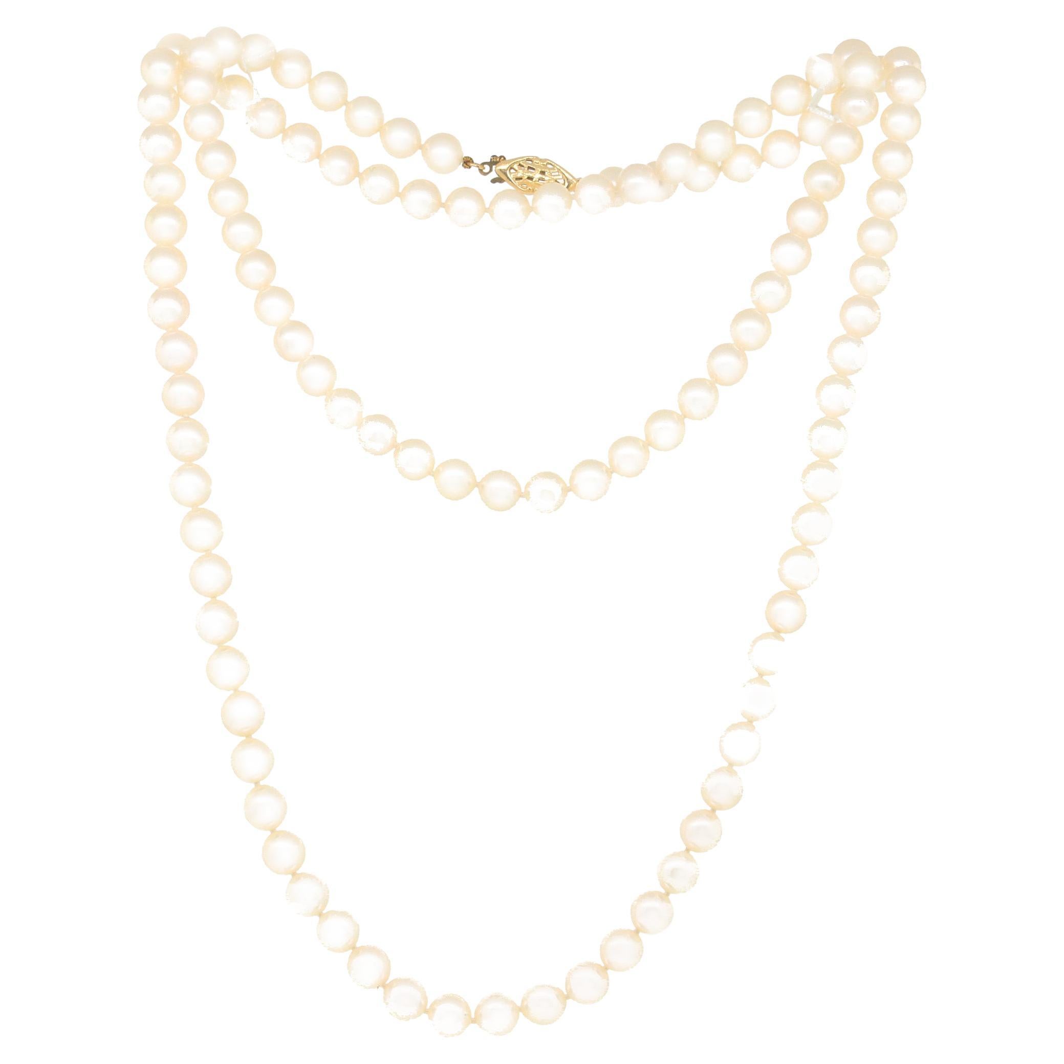 Collier de perles fines blanches naturelles à long brin en vente
