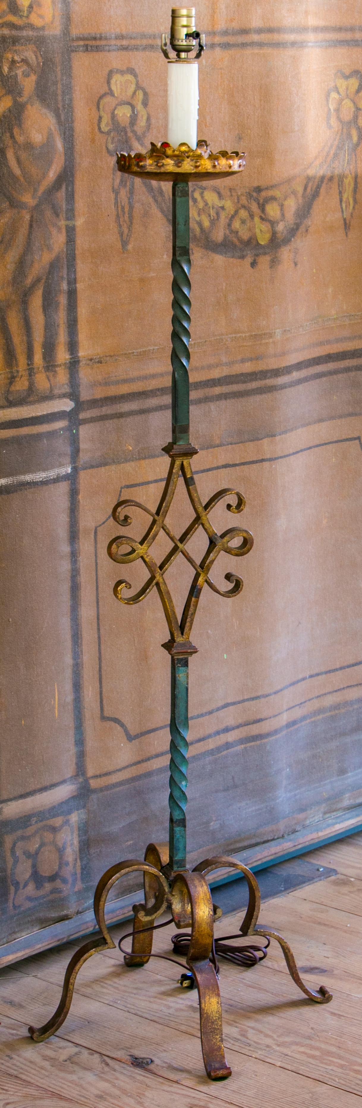 Fine twisted iron candle stand, with decorative scroll work detail. Painted green-blue patina with gilded detail finish. Hammered tole candle cup is 6.5 inch diameter and gilded. Sold without shade. Newly re-wired in the US using UL listed parts.